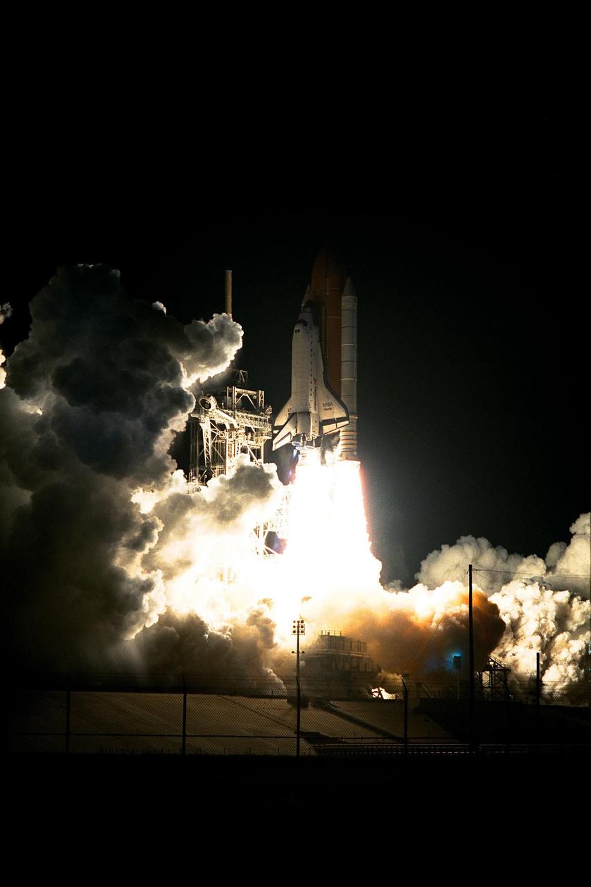 The Space Shuttle Atlantis blazes through the night sky to begin the STS-86 mission, slated to be the seventh of nine planned dockings of the Space Shuttle with the Russian Space Station Mir. Liftoff on Sept. 25 from Launch Pad 39A was at 10:34:19 p.m. EDT, within seconds of the preferred time, during a six-minute, 45-second launch window. The 10-day flight will include the transfer of the sixth U.S. astronaut to live and work aboard the Mir. After the docking, STS-86 Mission Specialist David A. Wolf will become a member of the Mir 24 crew, replacing astronaut C. Michael Foale, who will return to Earth aboard Atlantis with the remainder of the STS-86 crew. Foale has been on the Russian Space Station since mid-May. Wolf is scheduled to remain there about four months. Besides Wolf (embarking to Mir) and Foale (returning), the STS-86 crew includes Commander James D. Wetherbee, Pilot Michael J. Bloomfield, and Mission Specialists Wendy B. Lawrence, Scott E. Parazynski, Vladimir Georgievich Titov of the Russian Space Agency, and Jean-Loup J.M. Chretien of the French Space Agency, CNES. Other primary objectives of the mission are a spacewalk by Parazynski and Titov, and the exchange of about three-and-a-half tons of science/logistical equipment and supplies between Atlantis and the Mir