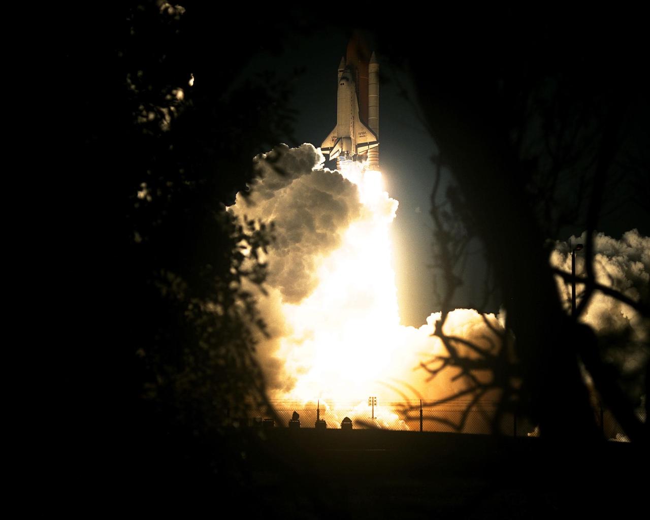 The Space Shuttle Atlantis blazes through the night sky to begin the STS-86 mission, slated to be the seventh of nine planned dockings of the Space Shuttle with the Russian Space Station Mir. Liftoff on Sept. 25 from Launch Pad 39A was at 10:34:19 p.m. EDT, within seconds of the preferred time, during a six-minute, 45-second launch window. The 10-day flight will include the transfer of the sixth U.S. astronaut to live and work aboard the Mir. After the docking, STS-86 Mission Specialist David A. Wolf will become a member of the Mir 24 crew, replacing astronaut C. Michael Foale, who will return to Earth aboard Atlantis with the remainder of the STS-86 crew. Foale has been on the Russian Space Station since mid-May. Wolf is scheduled to remain there about four months. Besides Wolf (embarking to Mir) and Foale (returning), the STS-86 crew includes Commander James D. Wetherbee, Pilot Michael J. Bloomfield, and Mission Specialists Wendy B. Lawrence, Scott E. Parazynski, Vladimir Georgievich Titov of the Russian Space Agency, and Jean-Loup J.M. Chretien of the French Space Agency, CNES. Other primary objectives of the mission are a spacewalk by Parazynski and Titov, and the exchange of about three-and-a-half tons of science/logistical equipment and supplies between Atlantis and the Mir
