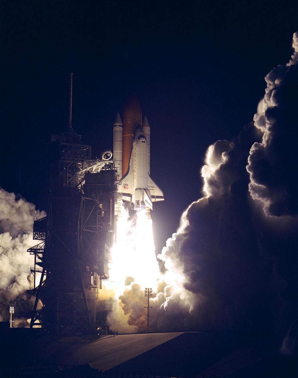 The Space Shuttle Atlantis blazes through the night sky to begin the STS-86 mission, slated to be the seventh of nine planned dockings of the Space Shuttle with the Russian Space Station Mir. Liftoff on Sept. 25 from Launch Pad 39A was at 10:34:19 p.m. EDT, within seconds of the preferred time, during a six-minute, 45-second launch window. The 10-day flight will include the transfer of the sixth U.S. astronaut to live and work aboard the Mir. After the docking, STS-86 Mission Specialist David A. Wolf will become a member of the Mir 24 crew, replacing astronaut C. Michael Foale, who will return to Earth aboard Atlantis with the remainder of the STS-86 crew. Foale has been on the Russian Space Station since mid-May. Wolf is scheduled to remain there about four months. Besides Wolf (embarking to Mir) and Foale (returning), the STS-86 crew includes Commander James D. Wetherbee, Pilot Michael J. Bloomfield, and Mission Specialists Wendy B. Lawrence, Scott E. Parazynski, Vladimir Georgievich Titov of the Russian Space Agency, and Jean-Loup J.M. Chretien of the French Space Agency, CNES. Other primary objectives of the mission are a spacewalk by Parazynski and Titov, and the exchange of about three-and-a-half tons of science/logistical equipment and supplies between Atlantis and the Mir