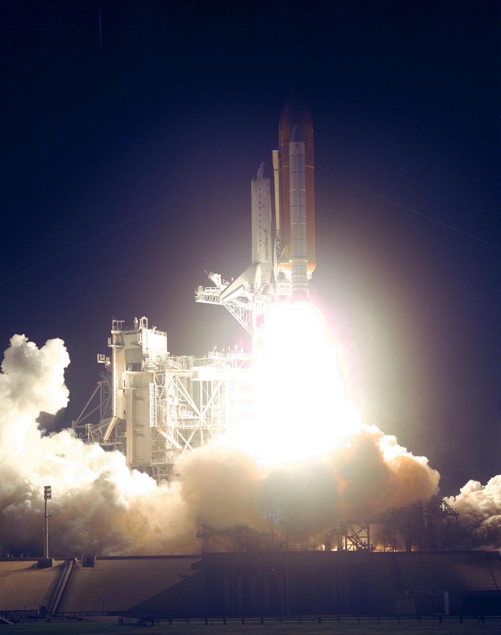 The Space Shuttle Atlantis blazes through the night sky to begin the STS-86 mission, slated to be the seventh of nine planned dockings of the Space Shuttle with the Russian Space Station Mir. Liftoff on Sept. 25 from Launch Pad 39A was at 10:34:19 p.m. EDT, within seconds of the preferred time, during a six-minute, 45-second launch window. The 10-day flight will include the transfer of the sixth U.S. astronaut to live and work aboard the Mir. After the docking, STS-86 Mission Specialist David A. Wolf will become a member of the Mir 24 crew, replacing astronaut C. Michael Foale, who will return to Earth aboard Atlantis with the remainder of the STS-86 crew. Foale has been on the Russian Space Station since mid-May. Wolf is scheduled to remain there about four months. Besides Wolf (embarking to Mir) and Foale (returning), the STS-86 crew includes Commander James D. Wetherbee, Pilot Michael J. Bloomfield, and Mission Specialists Wendy B. Lawrence, Scott E. Parazynski, Vladimir Georgievich Titov of the Russian Space Agency, and Jean-Loup J.M. Chretien of the French Space Agency, CNES. Other primary objectives of the mission are a spacewalk by Parazynski and Titov, and the exchange of about three-and-a-half tons of science/logistical equipment and supplies between Atlantis and the Mir