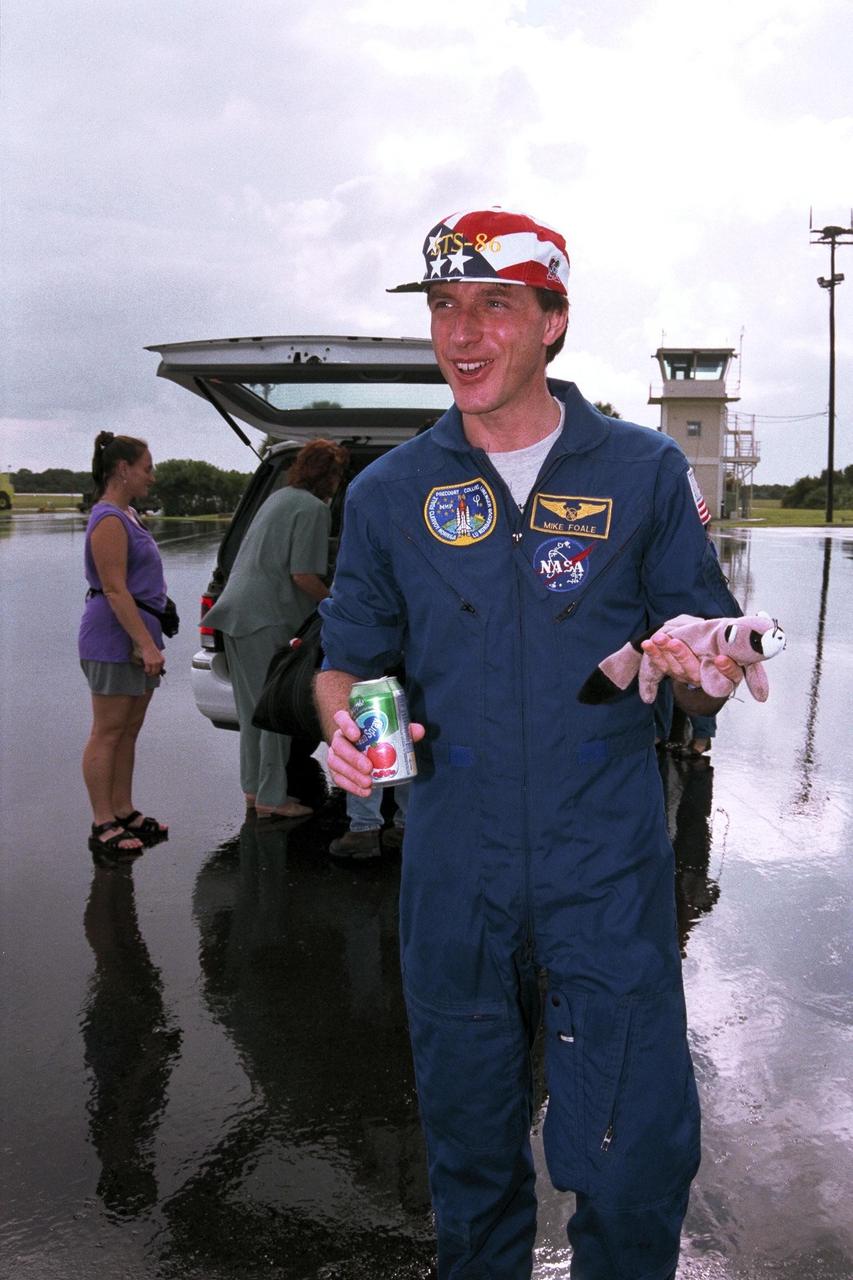 At the Skid Strip on Cape Canaveral Air Station, astronaut C. Michael Foale prepares to return to the Johnson Space Center in Houston, Texas. He spent approximately four-and-a-half months living and working aboard the Russian Space Station Mir. Foale returned to Earth Oct. 6 aboard the Space Shuttle orbiter Atlantis, which docked with the Mir during the just-completed STS-86 Shuttle mission. Foale was replaced on the Mir by STS-86 Mission Specialist David A. Wolf