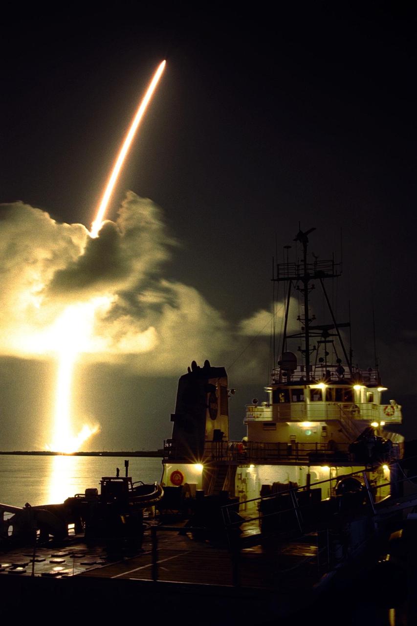 A seven-year journey to the ringed planet Saturn begins with the liftoff of a Titan IVB/Centaur carrying the Cassini orbiter and its attached Huygens probe. This spectacular streak shot was taken from Hangar AF on Cape Canaveral Air Station, with a solid rocket booster retrieval ship in the foreground. Launch occurred at 4:43 a.m. EDT, Oct. 15, from Launch Complex 40 on Cape Canaveral Air Station. After a 2.2-billion mile journey that will include two swingbys of Venus and one of Earth to gain additional velocity, the two-story tall spacecraft will arrive at Saturn in July 2004. The orbiter will circle the planet for four years, its complement of 12 scientific instruments gathering data about Saturn's atmosphere, rings and magnetosphere and conducting closeup observations of the Saturnian moons. Huygens, with a separate suite of six science instruments, will separate from Cassini to fly on a ballistic trajectory toward Titan, the only celestial body besides Earth to have an atmosphere rich in nitrogen. Scientists are eager to study further this chemical similarity in hopes of learning more about the origins of our own planet Earth. Huygens will provide the first direct sampling of Titan's atmospheric chemistry and the first detailed photographs of its surface. The Cassini mission is an international effort involving NASA, the European Space Agency (ESA) and the Italian Space Agency, Agenzia Spaziale Italiana (ASI). The Jet Propulsion Laboratory manages the U.S. contribution to the mission for NASA's Office of Space Science. The major U.S. contractor is Lockheed Martin, which provided the launch vehicle and upper stage, spacecraft propulsion module and radioisotope thermoelectric generators that will provide power for the spacecraft. The Titan IV/Centaur is a U.S. Air Force launch vehicle, and launch operations were managed by the 45th Space Wing