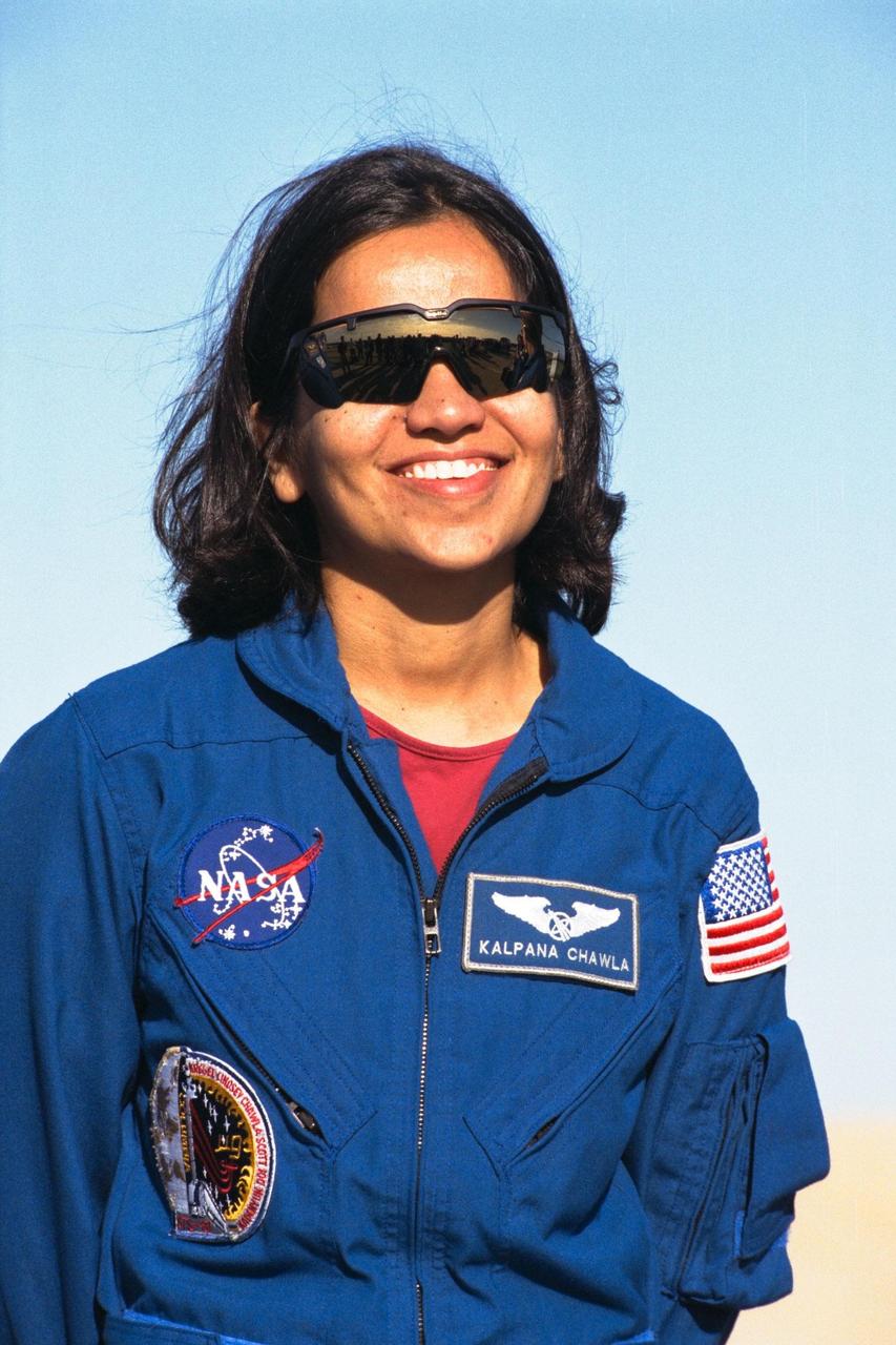 Kalpana Chawla, Ph.D., a mission specialist of the STS-87 crew, participates in a news briefing at Launch Pad 39B during the Terminal Countdown Demonstration Test (TCDT) at Kennedy Space Center (KSC). First-time Shuttle flier Dr. Chawla reported for training as an astronaut at Johnson Space Center in 1995. She has a doctorate in aerospace engineering from the University of Colorado. The TCDT is held at KSC prior to each Space Shuttle flight providing the crew of each mission opportunities to participate in simulated countdown activities. The TCDT ends with a mock launch countdown culminating in a simulated main engine cut-off. The crew also spends time undergoing emergency egress training exercises at the pad and has an opportunity to view and inspect the payloads in the orbiter's payload bay. STS-87 is scheduled for launch Nov. 19 aboard the Space Shuttle Columbia from pad 39B at KSC