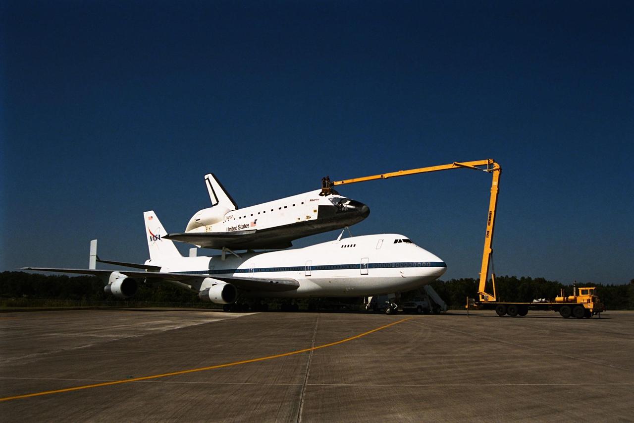 KENNEDY SPACE CENTER, FLA. -- The orbiter Atlantis sits atop the Shuttle Carrier Aircraft at Kennedy Space Center’s (KSC’s) Shuttle Landing Facility. Atlantis is being prepared for its ferry flight to Palmdale, Calif., for its Orbiter Maintenance Down Period at Palmdale’s Orbiter Assembly Facility, where it will remain until August 1998. There, modifications and structural inspections will be conducted in preparation for Atlantis’ future missions to support International Space Station assembly activities. Atlantis’ next flight into space is scheduled to be Space Shuttle mission STS-92, targeted for launch from KSC in January 1999