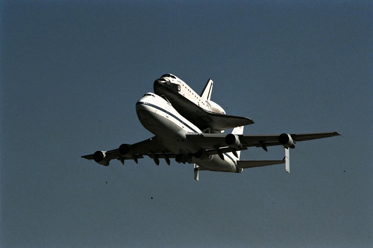 KENNEDY SPACE CENTER, FLA. -- The orbiter Atlantis, riding atop the modified Boeing 747 Shuttle Carrier Aircraft, departed Kennedy Space Center (KSC) at 1:53 p.m. on Nov. 11 en route to Palmdale, Calif., for the planned Orbiter Maintenance Down Period. Atlantis departed from KSC’s Shuttle Landing Facility Runway 33 for Palmdale’s Orbiter Assembly Facility, where it will remain until August 1998. At Palmdale, modifications and structural inspections will be conducted in preparation for Atlantis’ future missions to support International Space Station assembly activities. Atlantis’ next flight into space is scheduled to be Space Shuttle mission STS-92, targeted for launch from KSC in January 1999