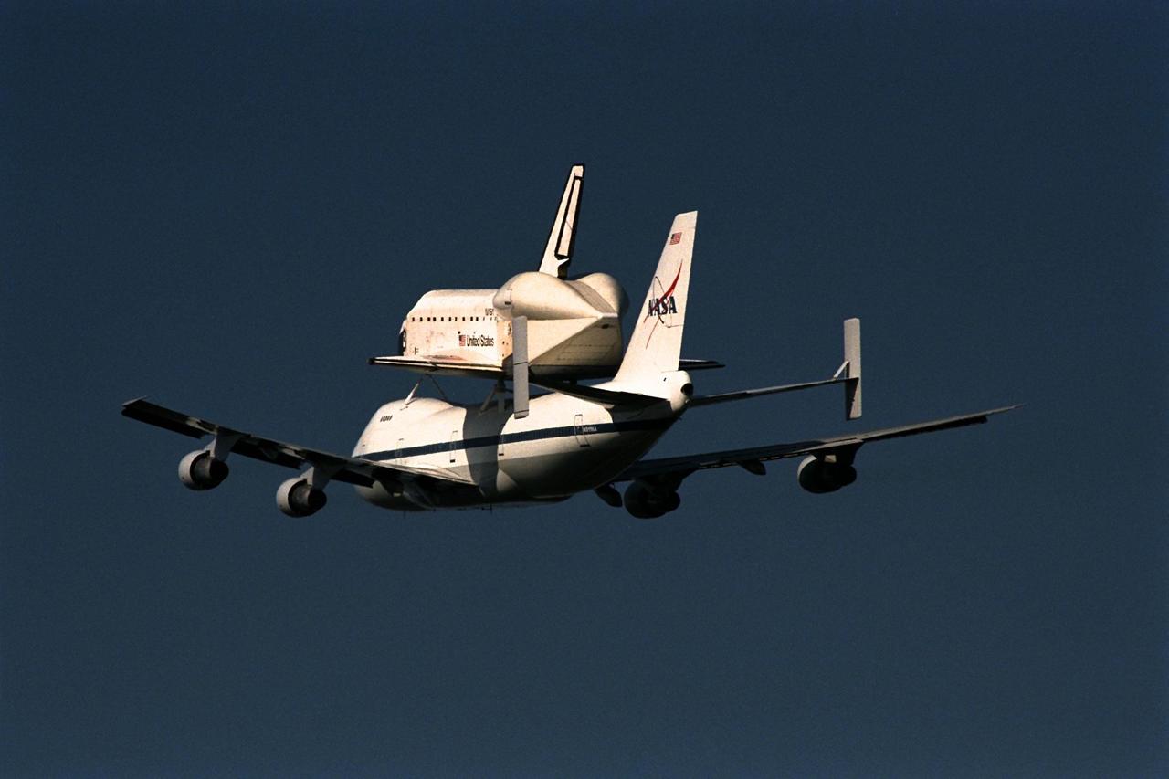 KENNEDY SPACE CENTER, FLA. -- The orbiter Atlantis, riding atop the modified Boeing 747 Shuttle Carrier Aircraft, departed Kennedy Space Center (KSC) on Nov. 11 at 1:53 p.m. en route to Palmdale, Calif., for its planned Orbiter Maintenance Down Period. Atlantis departed from KSC’s Shuttle Landing Facility Runway 33 for Palmdale’s Orbiter Assembly Facility, where it will remain until August 1998. At Palmdale, modifications and structural inspections will be conducted in preparation for Atlantis’ future missions to support International Space Station assembly activities. Atlantis’ next flight into space is scheduled to be Space Shuttle mission STS-92, targeted for launch from KSC in January 1999
