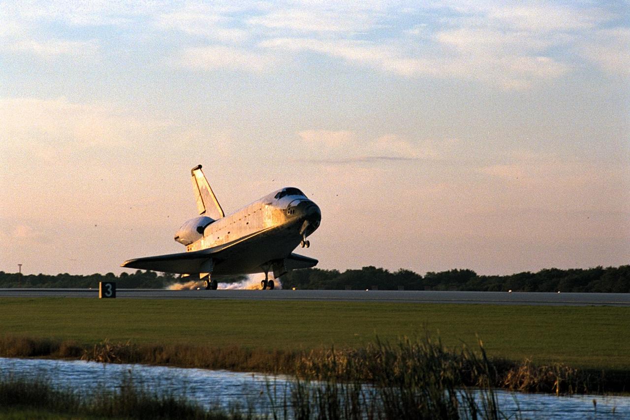With Commander Kevin Kregel and Pilot Steven Lindsey at the controls, the orbiter Columbia touches its main gear down on Runway 33 at KSC’s Shuttle Landing Facility at 7:20:04 a.m. EST Dec. 5 to complete the 15-day, 16-hour and 34-minute-long STS-87 mission of 6.5 million miles. Also onboard the orbiter are Mission Specialists Winston Scott; Kalpana Chawla, Ph.D.; and Takao Doi, Ph.D., of the National Space Development Agency of Japan; along with Payload Specialist Leonid Kadenyuk of the National Space Agency of Ukraine. During the 88th Space Shuttle mission, the crew performed experiments on the United States Microgravity Payload-4 and pollinated plants as part of the Collaborative Ukrainian Experiment. This was the 12th landing for Columbia at KSC and the 41st KSC landing in the history of the Space Shuttle program