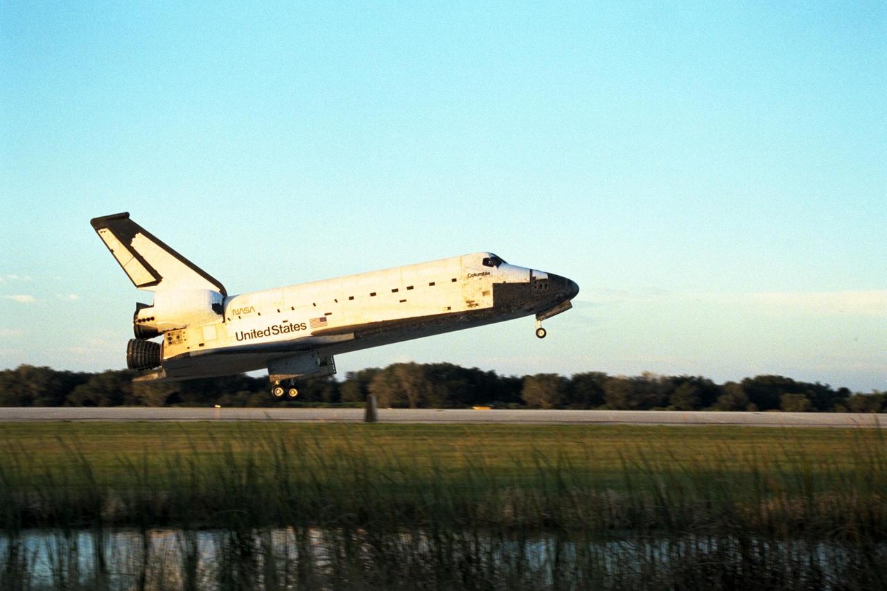 With Commander Kevin Kregel and Pilot Steven Lindsey at the controls, the orbiter Columbia makes a smooth touchdown on Runway 33 at KSC’s Shuttle Landing Facility at 7:20:04 a.m. EST Dec. 5, completing the 15-day, 16-hour and 34-minute-long STS-87 mission of 6.5 million miles. Also onboard the orbiter are Mission Specialists Winston Scott; Kalpana Chawla, Ph.D.; and Takao Doi, Ph.D., of the National Space Development Agency of Japan; along with Payload Specialist Leonid Kadenyuk of the National Space Agency of Ukraine. During the 88th Space Shuttle mission, the crew performed experiments on the United States Microgravity Payload-4 and pollinated plants as part of the Collaborative Ukrainian Experiment. This was the 12th landing for Columbia at KSC and the 41st KSC landing in the history of the Space Shuttle program