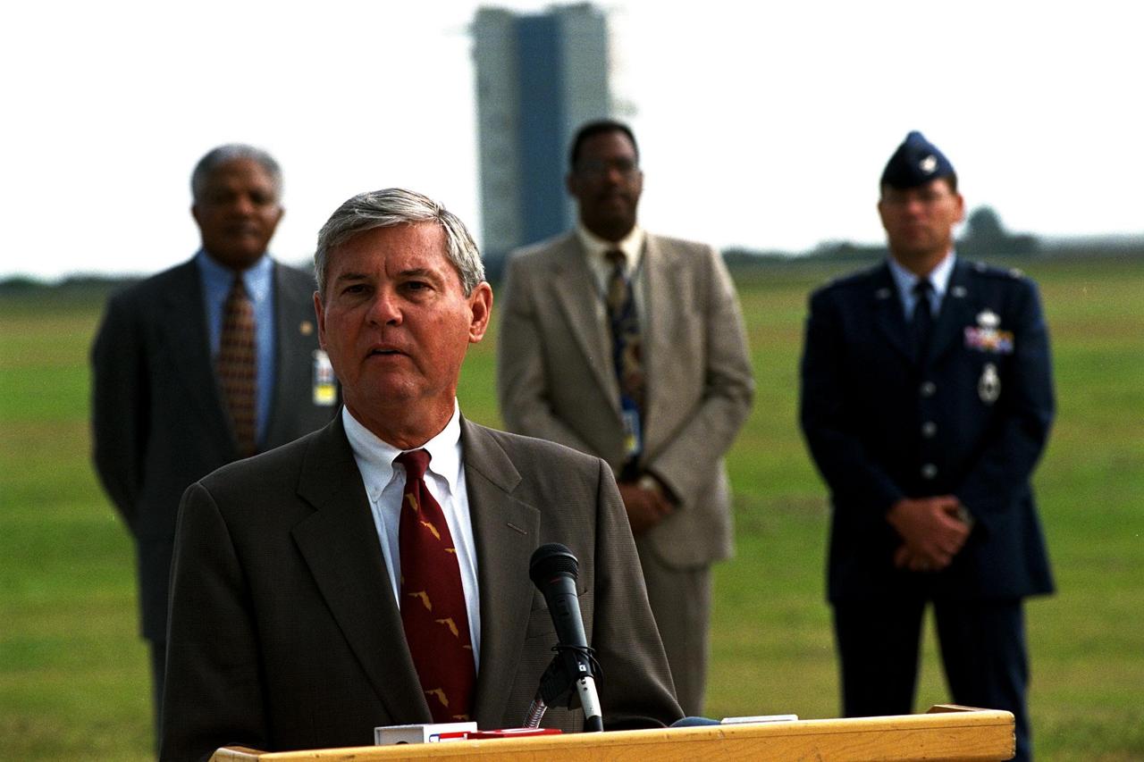 United States Senator Bob Graham of Florida announces important new federal legislation designed to support the nation's continued space industry development. The announcement was made at Launch Complex 46 at the Cape Canaveral Air Station, the dual-use Navy facility recently modified for commercial launches by the State of Florida. In the background, from left to right, are Hugh Brown, Chairman, Spaceport Florida Authority; Charles Johnson, Athena Program Manager, Lockheed Martin Astronautics; and Col. Ron Larivee, Vice Commander, 45th Space Wing