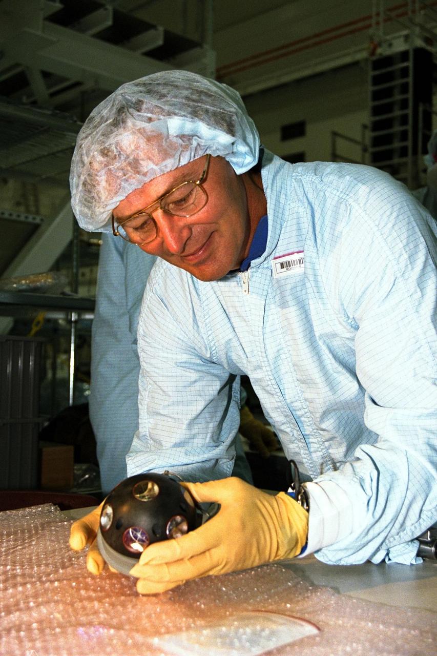 Mission Specialist Jerry Ross participates in the Crew Equipment Interface Test (CEIT) for STS-88 in KSC's Space Station Processing Facility. The CEIT gives astronauts an opportunity to get a hands-on look at the payloads with which they will be working on-orbit. STS-88, the first International Space Station assembly flight, is targeted for launch in July 1998 aboard Space Shuttle Endeavour