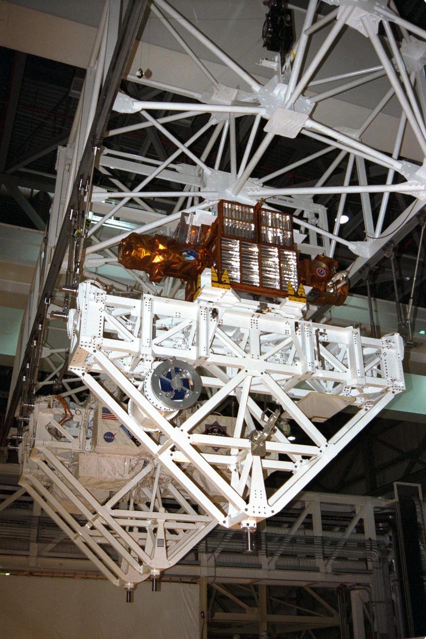 The Spartan payload, which flew on STS-87, is removed from Columbia's cargo bay in Orbiter Processing Facility Bay 3 and will be transported to the Vertical Processing Facility