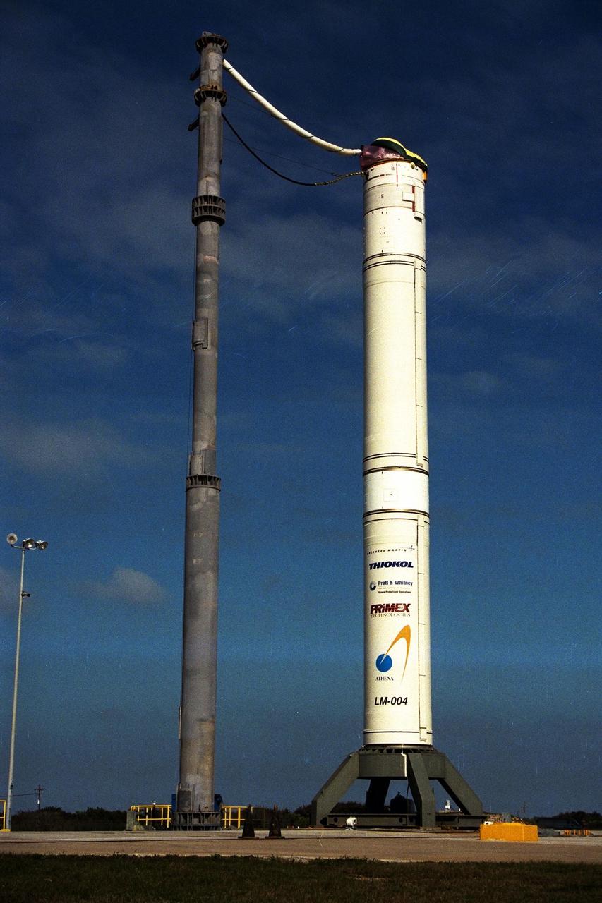 The access tower around the Athena II rocket for the Lunar Prospector spacecraft, to be launched for NASA by Lockheed Martin, was rolled back today at Launch Complex 46 at Cape Canaveral Air Station for final prelaunch preparations. The small robotic spacecraft is designed to provide the first global maps of the Moon's surface compositional elements and its gravitational and magnetic fields. The launch of Lunar Prospector is currently scheduled for Jan. 5, 1998 at 8:31 p.m