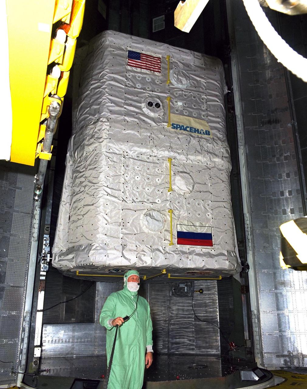KENNEDY SPACE CENTER, FLA. -- The SPACEHAB payload arrived at Launch Pad 39A this morning and was installed in the Payload Changeout Room. Final preparations for liftoff of the STS-89 mission are under way. Endeavour and its crew of seven are targeted for a Jan. 22 launch. STS-89 will be the eighth Shuttle docking with the Russian Space Station Mir as part of Phase 1 of the International Space Station program. Mission Specialist Andy Thomas, Ph.D., will succeed Mission Specialist David Wolf, M.D., as the last NASA astronaut scheduled for a long-duration stay aboard Mir