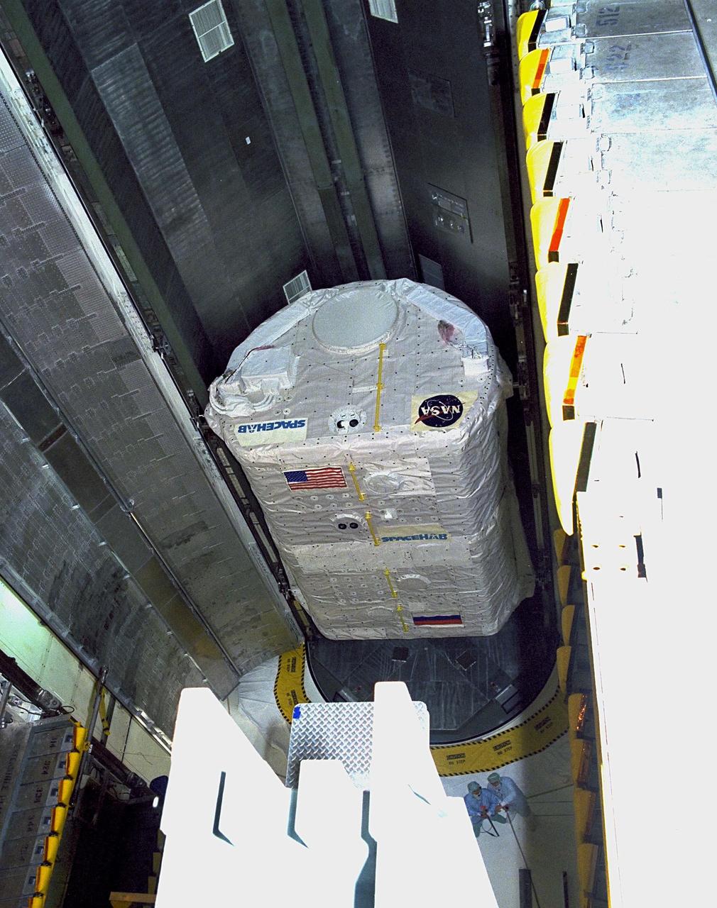 KENNEDY SPACE CENTER, FLA. -- The SPACEHAB payload arrived at Launch Pad 39A this morning and was installed in the Payload Changeout Room. Final preparations for liftoff of the STS-89 mission are under way. Endeavour and its crew of seven are targeted for a Jan. 22 launch. STS-89 will be the eighth Shuttle docking with the Russian Space Station Mir as part of Phase 1 of the International Space Station program. Mission Specialist Andy Thomas, Ph.D., will succeed Mission Specialist David Wolf, M.D., as the last NASA astronaut scheduled for a long-duration stay aboard Mir