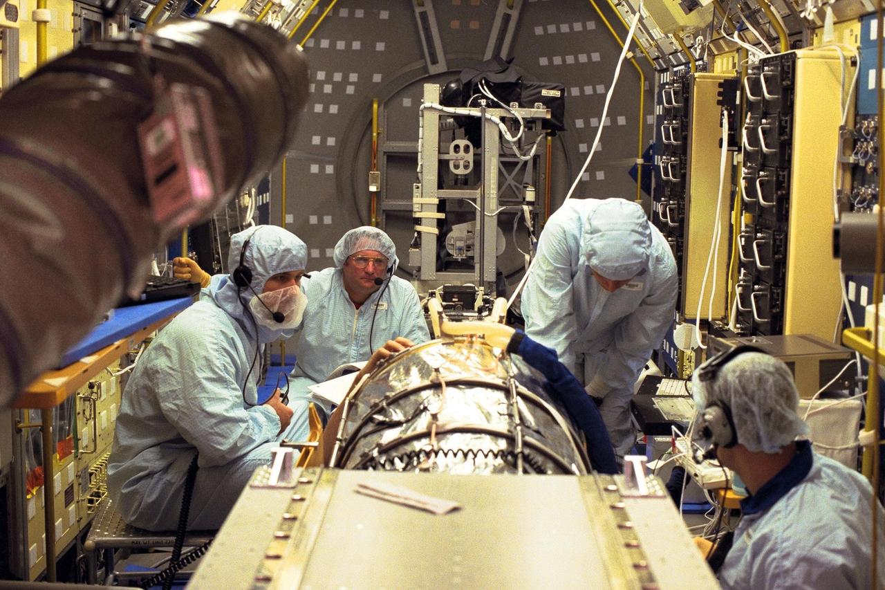 The Neurolab payload for STS-90, scheduled to launch aboard the Shuttle Columbia from Kennedy Space Center (KSC) on April 2, 1998, undergoes further processing in the Operations and Checkout Building at KSC. Investigations during the Neurolab mission will focus on the effects of microgravity on the nervous system. Specifically, experiments will study the adaptation of the vestibular system, the central nervous system, and the pathways that control the ability to sense location in the absence of gravity, as well as the effect of microgravity on a developing nervous system. The crew of STS-90 will include Commander Richard Searfoss, Pilot Scott Altman, Mission Specialists Richard Linnehan, Dafydd (Dave) Williams, M.D., and Kathryn (Kay) Hire, and Payload Specialists Jay Buckey, M.D., and James Pawelczyk, Ph.D