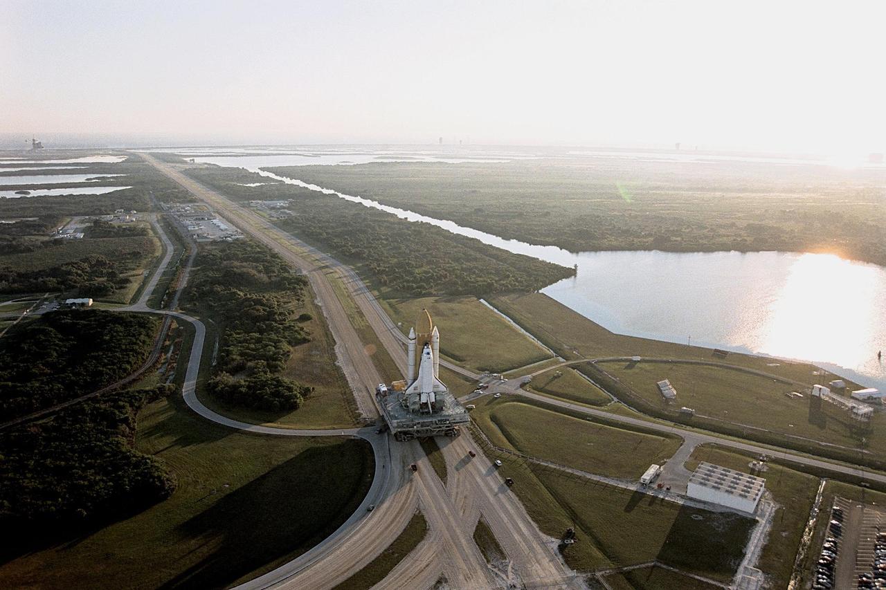KENNEDY SPACE CENTER, Fla. --  The Space Shuttle Endeavour rolls out to Launch Pad 39A, the destination of its  journey from the Vehicle Assembly Building, for final preparations for liftoff of the STS-89 mission. Endeavour and its crew of seven are targeted for a Jan. 22 launch. STS-89 will be the eighth Shuttle docking with the Russian Space Station Mir as part of Phase 1 of the International Space Station program. Mission Specialist Andy Thomas, Ph.D., will succeed Mission Specialist David Wolf, M.D., as the last NASA astronaut scheduled for a long-duration stay aboard Mir