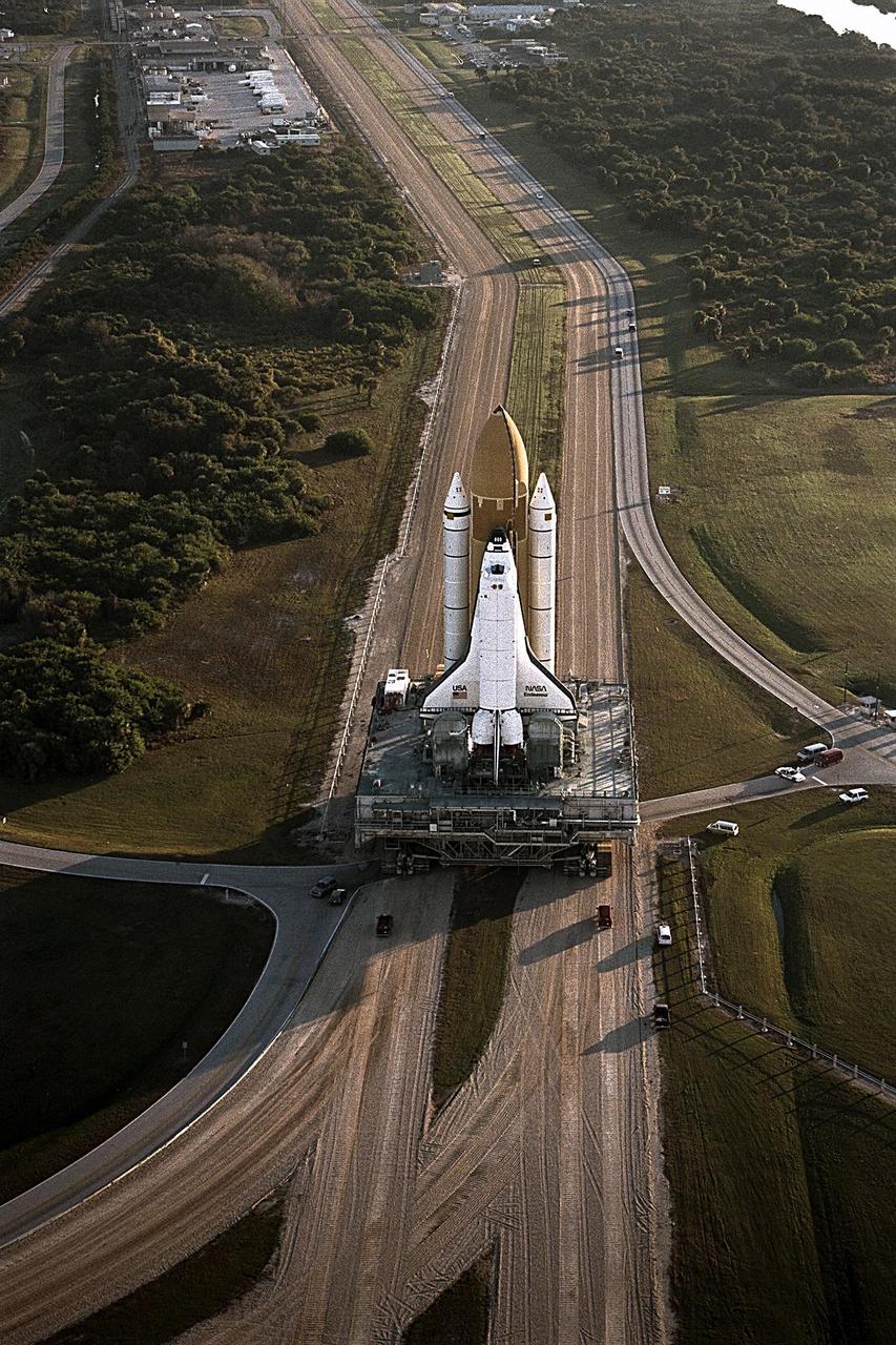 KENNEDY SPACE CENTER, Fla. --  The Space Shuttle Endeavour rolls out to Launch Pad 39A, the destination of its journey from the Vehicle Assembly Building, for final preparations for liftoff of the STS-89 mission. Endeavour and its crew of seven are targeted for a Jan. 22 launch. STS-89 will be the eighth Shuttle docking with the Russian Space Station Mir as part of Phase 1 of the International Space Station program. Mission Specialist Andy Thomas, Ph.D., will succeed Mission Specialist David Wolf, M.D., as the last NASA astronaut scheduled for a long-duration stay aboard Mir