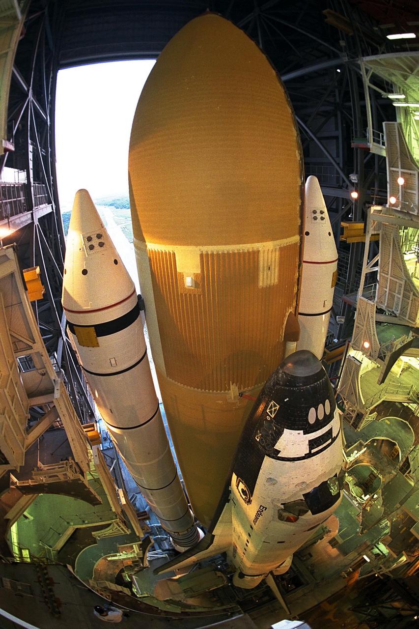 KENNEDY SPACE CENTER,  Fla. --  The Space Shuttle Endeavour rolls out to Launch Pad 39A, the destination of its journey from the Vehicle Assembly Building, for final preparations for liftoff of the STS-89 mission. Endeavour and its crew of seven are targeted for a Jan. 22 launch. STS-89 will be the eighth Shuttle docking with the Russian Space Station Mir as part of Phase 1 of the International Space Station program. Mission Specialist Andy Thomas, Ph.D., will succeed Mission Specialist David Wolf, M.D., as the last NASA astronaut scheduled for a long-duration stay aboard Mir