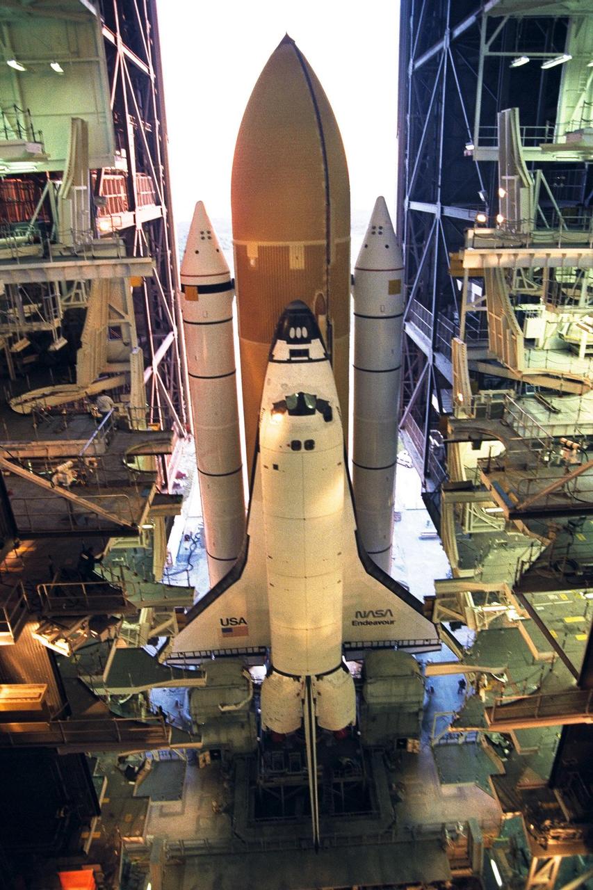 KENNEDY SPACE CENTER,  Fla. --  The Space Shuttle Endeavour rolls out to Launch Pad 39A, the destination of its journey from the Vehicle Assembly Building, for final preparations for liftoff of the STS-89 mission. Endeavour and its crew of seven are targeted for a Jan. 22 launch. STS-89 will be the eighth Shuttle docking with the Russian Space Station Mir as part of Phase 1 of the International Space Station program. Mission Specialist Andy Thomas, Ph.D., will succeed Mission Specialist David Wolf, M.D., as the last NASA astronaut scheduled for a long-duration stay aboard Mir