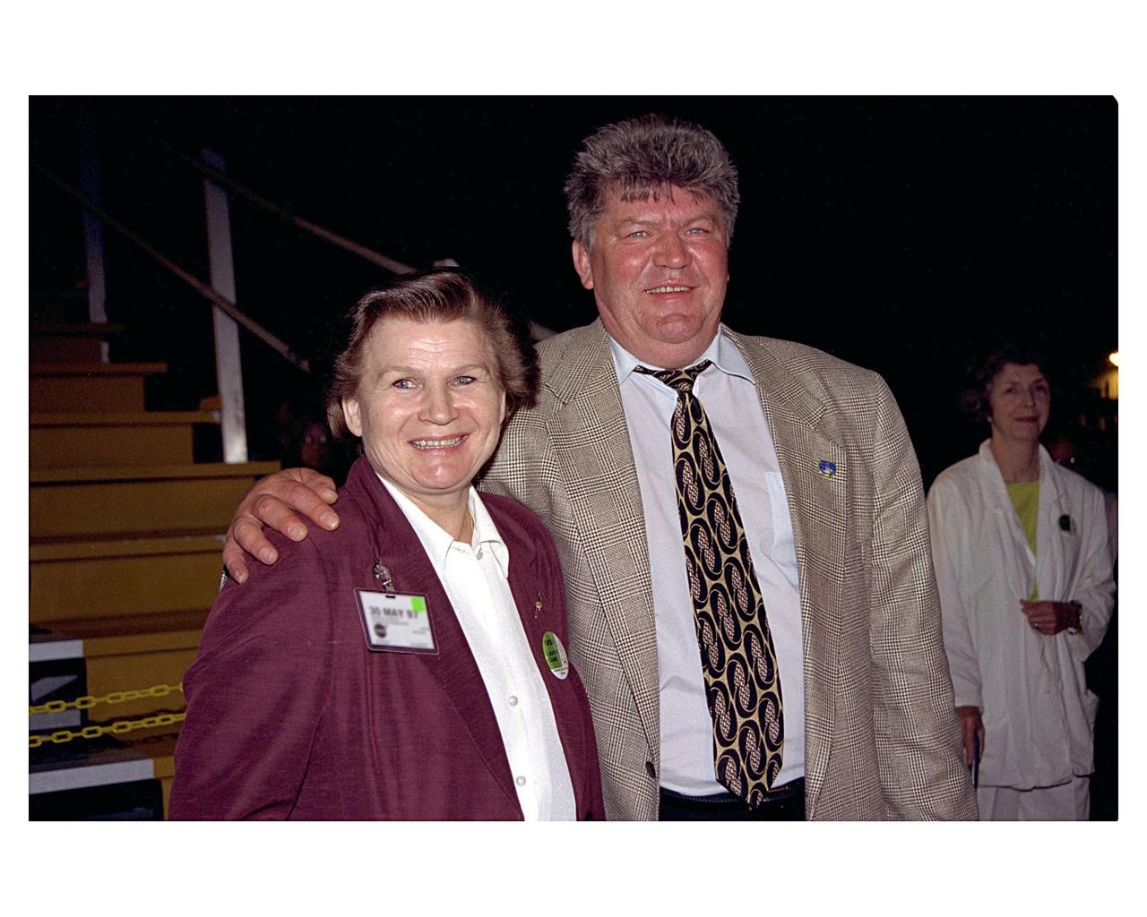 Valentina Terestkova, the first woman in space, and Valeri Ryumin, Phase One Director, RSC Energia, view the STS-84 launch at VIP site