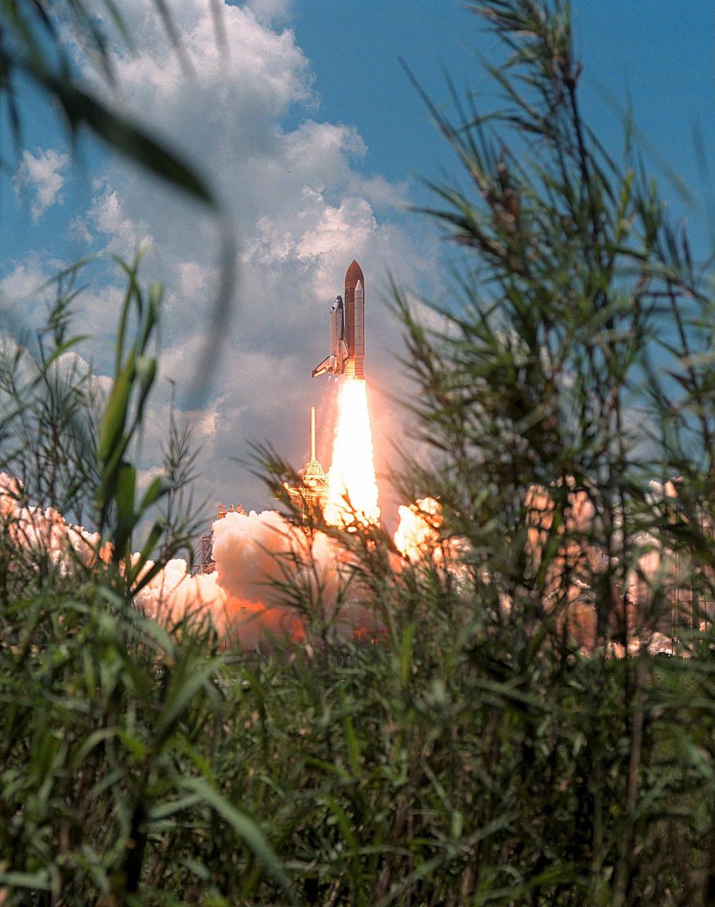 KENNEDY SPACE CENTER, Fla. -- The Space Shuttle Columbia soars from Launch  Pad 39A at 2:02 p.m. EDT July 1 to begin the 16-day STS-94 Microgravity Science  Laboratory-1 (MSL-1) mission. The launch window was opened 47 minutes earlier than  the originally scheduled time of 2:37 p.m. to improve the opportunity to lift off before  Florida summer rain showers reached the space center. The  crew members are Mission  Commander James D. Halsell Jr.; Pilot Susan L. Still; Payload Commander Janice Voss;  Mission Specialists Michael L.Gernhardt and Donald A. Thomas; and Payload Specialists  Roger K. Crouch and Gregory T. Linteris. During the space flight, the MSL-1 will be  used to test some of the hardware, facilities and procedures that are planned for use on the  International Space Station while the flight crew conducts combustion, protein crystal  growth and materials processing experiments. Also onboard is the Hitchhiker Cryogenic  Flexible Diode (CRYOFD) experiment payload, which is attached to the right side of  Columbia’s payload bay. These payloads had previously flown on the STS-83 mission in  April, which was cut short after nearly four days because of indications of a faulty fuel  cell. STS-94 is a reflight of that mission