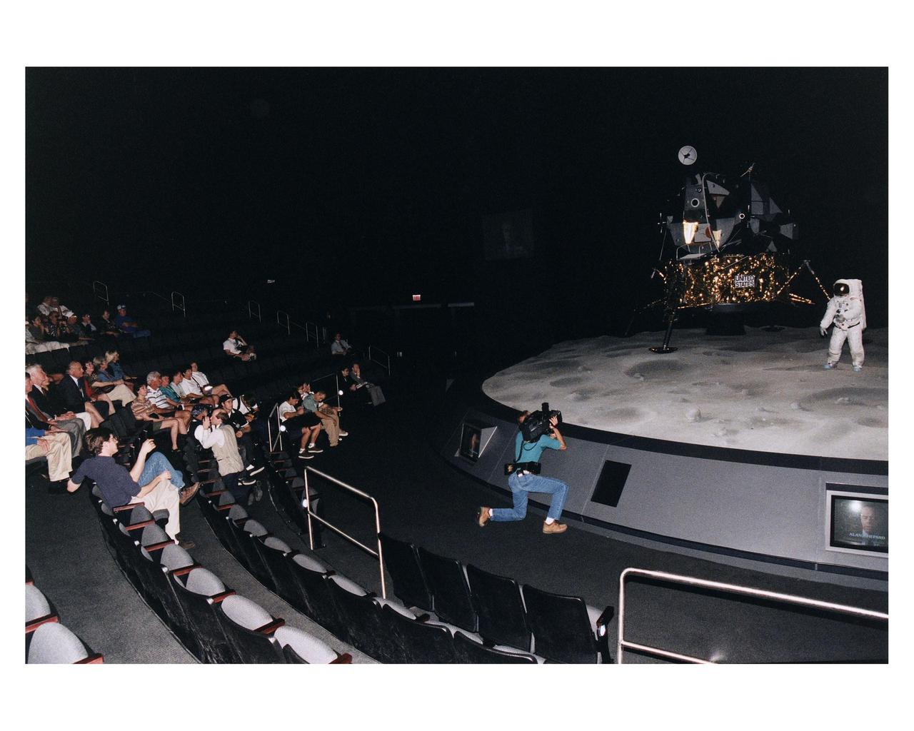 KENNEDY SPACE CENTER, FLA. -- Some of the former Apollo program astronauts observe a Lunar Module and Moon mockup during a tour the new Apollo/Saturn V Center (ASVC) at KSC prior to the gala grand opening ceremony for the facility that was held Jan. 8, 1997. The astronauts were invited to participate in the event, which also featured NASA Administrator Dan Goldin and KSC Director Jay Honeycutt. Some of the visiting astonauts were (from left): Apollo 10 Lunar Module Pilot and Apollo 17 Commander Eugene A. Cernan; Apollo 9 Lunar Module Pilot Russell L. Schweikart; Apollo 10 Command Module Pilot and Apollo 16 Commander John W. Young; Apollo 10 Commander Thomas P. Stafford; and Apollo 11 Lunar Module Pilot Edwin E. "Buzz" Aldrin, Jr. The ASVC also features several other Apollo program spacecraft components, multimedia presentations and a simulated Apollo/Saturn V liftoff. The facility will be a part of the KSC bus tour that embarks from the KSC Visitor Center