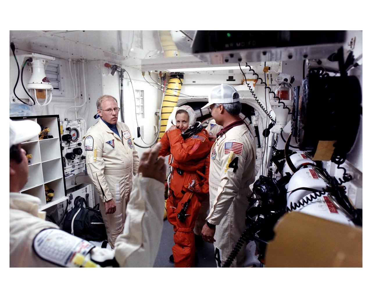 STS-81 crew in the White Room at LC 39