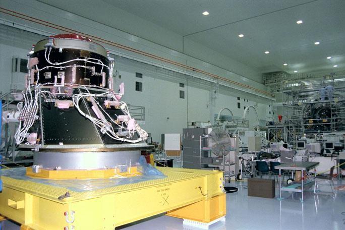 KENNEDY SPACE CENTER, FLA. --  The Pressurized Mating Adapter 2 (PMA 2), at left, part of the first International Space Station (ISS) element to be launched from the U.S., awaits prelaunch processing in the Space Station Processing Facility after its arrival at KSC.  PMAs 1 and 2 attached to a component called Node 1, shown in background at far right, to form the first U.S.-launched ISS element.  The Node 1/PMA assembly will provide key connecting points in orbit for other Space Station modules and for docking of the orbiter with the ISS.  PMA 1 will provide the interface between U.S. and Russian elements of the Station; PMA 2 will provide a Shuttle orbiter docking area.  The Node 1/PMA assembly is targeted for liftoff aboard the Space Shuttle Endeavour on STS-88 in July 1998.