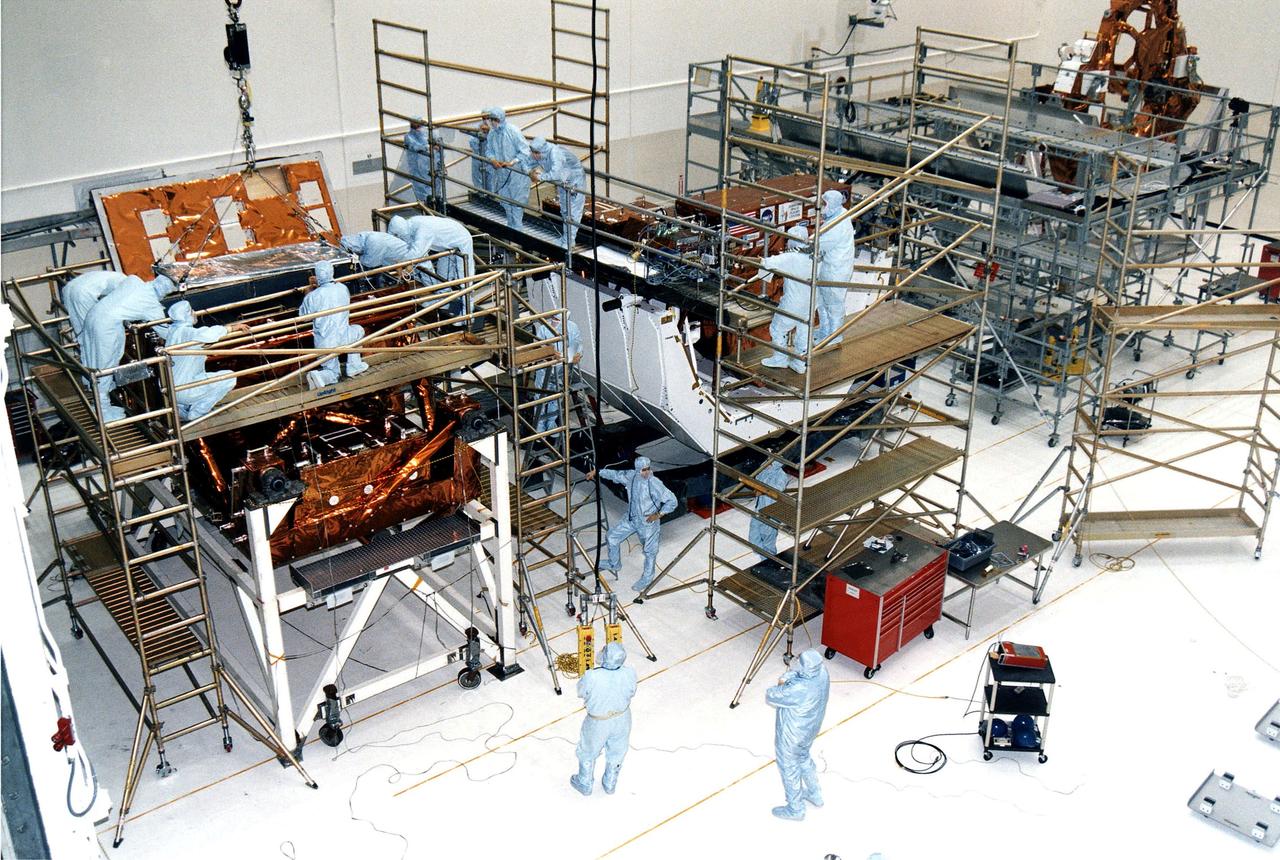 KENNEDY SPACE CENTER, FLA. - Workers in KSC's Vertical Processing Facility make final prelaunch prepartions to various payload elements that are part of the second Hubble Space Telescope (HST) servicing mission, STS-82. Liftoff is targeted Feb. 11 aboard Discovery with a crew of seven.