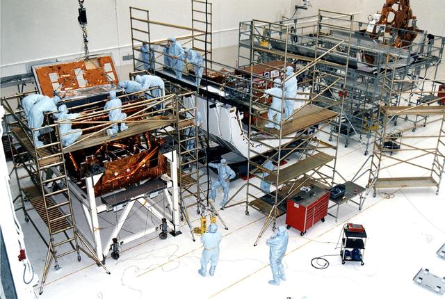 KENNEDY SPACE CENTER, FLA. - Workers in KSC's Vertical Processing Facility make final prelaunch prepartions to various payload elements that are part of the second Hubble Space Telescope (HST) servicing mission, STS-82.  Liftoff is targeted Feb. 11 aboard Discovery with a crew of seven.