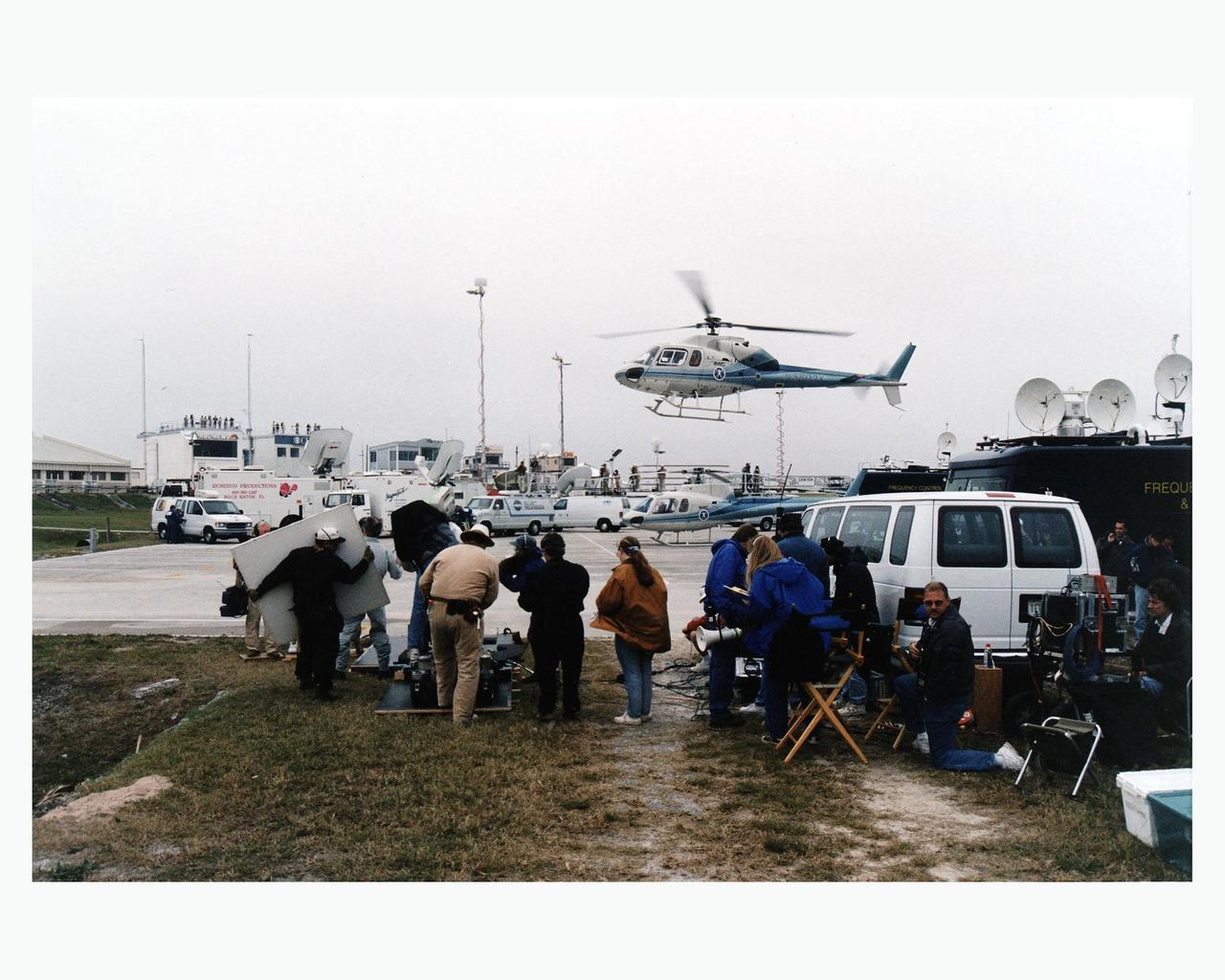 Warner Bros.' cast and crew are filming scenes for the movie "Contact" at Kennedy Space Center's Launch Complex 39 Press Site on January 30. The screenplay for "Contact" is based on the best-selling novel by the late astronomer Carl Sagan. The cast includes Jodie Foster, Matthew McConaughey, John Hurt, James Woods, Tom Skerritt, David Morse, William Fichtner, Rob Lowe and Angela Bassett. Described by Warner Bros. as a science fiction drama, "Contact" will depict humankind's first encounter with evidence of extraterrestrial life