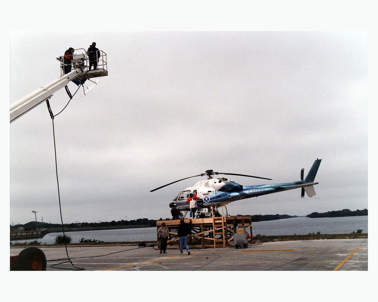Warner Bros.' cast and crew are filming scenes for the movie "Contact" at Kennedy Space Center's Launch Complex 39 Press Site on January 30. The screenplay for "Contact" is based on the best-selling novel by the late astronomer Carl Sagan. The cast includes Jodie Foster, Matthew McConaughey, John Hurt, James Woods, Tom Skerritt, David Morse, William Fichtner, Rob Lowe and Angela Bassett. Described by Warner Bros. as a science fiction drama, "Contact" will depict humankind's first encounter with evidence of extraterrestrial life