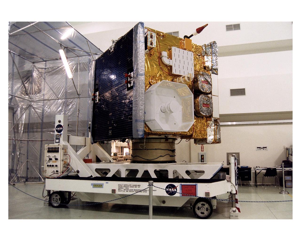 The Geostationary Operational Environmental Satellite-K (GOES-K) is placed on display for news media representatives at the Astrotech Space Operations LP facility in Titusville. GOES-K, the latest in the current series of advanced geostationary weather satellites in service, is scheduled to be launched into space aboard an Atlas 1 rocket on April 24 from Launch Complex 36, Pad B, Cape Canaveral Air Station. Once in orbit, GOES-K will become GOES-10, joining GOES-8 and GOES-9 in space