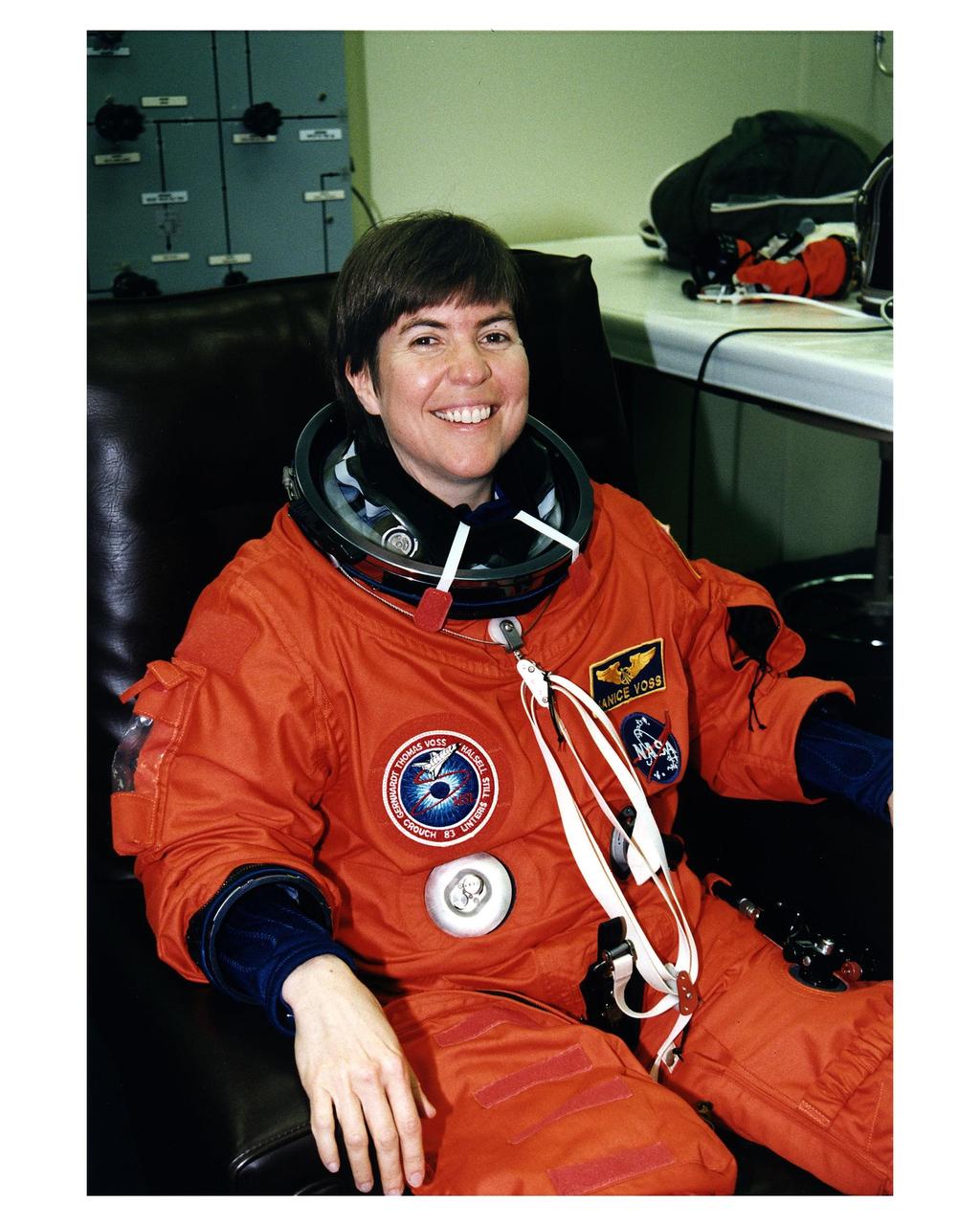 STS-83 Payload Commander Janice Voss smiles as she is assisted into her launch/entry suit in the Operations and checkout (O&C) Building. She has flown on STS-63 and STS-57. Voss holds a doctorate degree in aeronautics/astronautics from the Massachusetts Institute of Technology and has earned two NASA Space Flight Medals. As Payload Commander and a member of the Blue team, Voss will have overall responsibility for the operation of all of the MSL-1 experiments. During the experimentation phase of the mission, she will be working primarily with three combustion experiments. She and six fellow crew members will shortly depart the O&C and head for Launch Pad 39A, where the Space Shuttle Columbia will lift off during a launch window that opens at 2:00 p.m. EST, April 4