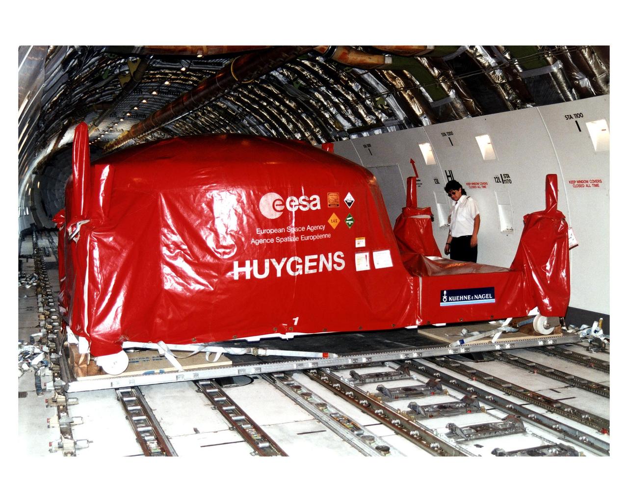 The Huygens probe, which will study the clouds, atmosphere and surface of Saturn's moon, Titan, as part of the Cassini mission to Saturn, arrives in a cargo plane at the Skid Strip, Cape Canaveral Air Station (CCAS). The probe was designed and developed for the European Space Agency (ESA) by a European industrial consortium led by Aerospatiale as prime contractor. Over the past year, it was integrated and tested at the facilities of Daimler Benz Aerospace Dornier Satellitensysteme in Germany. The probe will be mated to the Cassini orbiter, which was designed and assembled at NASA's Jet Propulsion Laboratory in California. The Cassini launch is targeted for October 6 from CCAS aboard a Titan IVB/Centaur expendable launch vehicle. After arrival at Saturn in 2004, the probe will be released from the Cassini orbiter to enter the Titan atmosphere