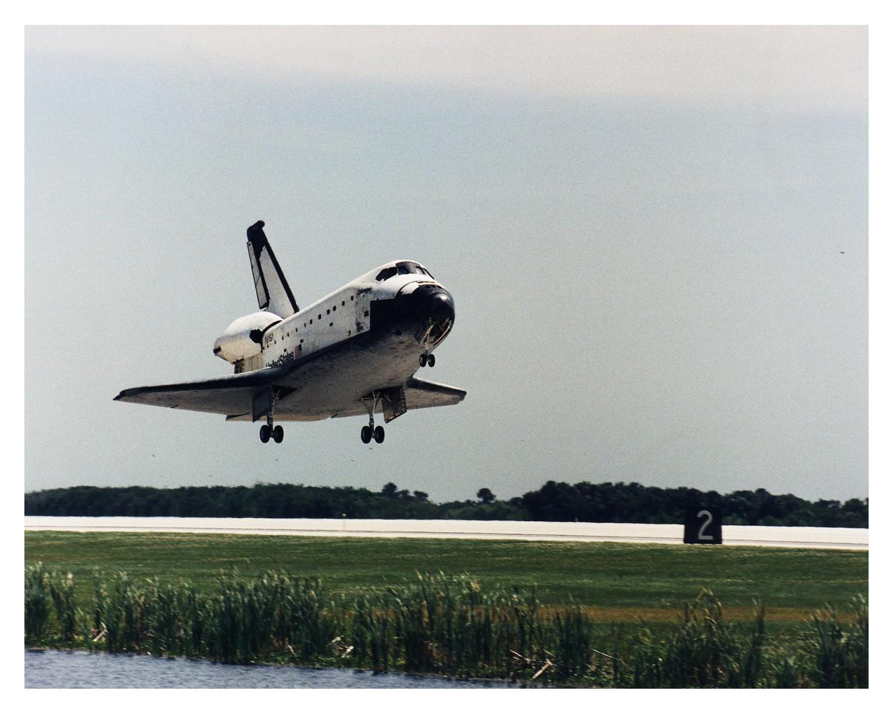 KENNEDY SPACE CENTER, FLA. -- The Space Shuttle Columbia prepares to touch down on Runway 33 at KSC's Shuttle Landing Facility at approximately 2:33 p.m. EDT, April 8, to conclude the Microgravity Science Laboratory-1 (MSL-1) mission. At main gear touchdown, the STS-83 mission duration will be just under four days. The planned 16-day mission was cut short by a faulty fuel cell. This is only the third time in Shuttle program history that an orbiter was brought home early due to mechanical problems. This was also the 36th KSC landing since the program began in 1981. Mission Commander James D. Halsell, Jr. flew Columbia to a perfect landing with help from Pilot Susan L. Still. Other crew members are Payload Commander Janice E. Voss; Mission Specialists Michael L.Gernhardt and Donald A. Thomas; and Payload Specialists Roger K. Crouch and Gregory T. Linteris. In spite of the abbreviated flight, the crew was able to perform MSL-1 experiments. The Spacelab-module-based experiments were used to test some of the hardware, facilities and procedures that are planned for use on the International Space Station and to conduct combustion, protein crystal growth and materials processing investigations