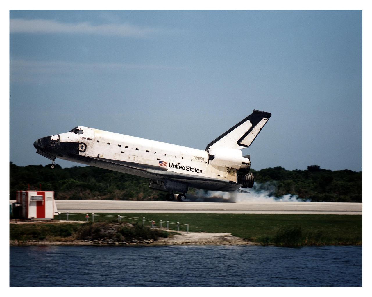 KENNEDY SPACE CENTER, FLA. -- The Space Shuttle Columbia touches down on Runway 33 at KSC's Shuttle Landing Facility at 2:33:11 p.m. EDT, April 8, to conclude the Microgravity Science Laboratory-1 (MSL-1) mission. At main gear touchdown, the STS-83 mission duration was 3 days, 23 hours, 12 minutes. The planned 16-day mission was cut short by a faulty fuel cell. This is only the third time in Shuttle program history that an orbiter was brought home early due to mechanical problems. This was also the 36th KSC landing since the program began in 1981. Mission Commander James D. Halsell, Jr. flew Columbia to a perfect landing with help from Pilot Susan L. Still. Other crew members are Payload Commander Janice E. Voss; Mission Specialists Michael L. Gernhardt and Donald A. Thomas; and Payload Specialists Roger K. Crouch and Gregory T. Linteris. In spite of the abbreviated flight, the crew was able to perform MSL-1 experiments. The Spacelab-module-based experiments were used to test some of the hardware, facilities and procedures that are planned for use on the International Space Station and to conduct combustion, protein crystal growth and materials processing investigations