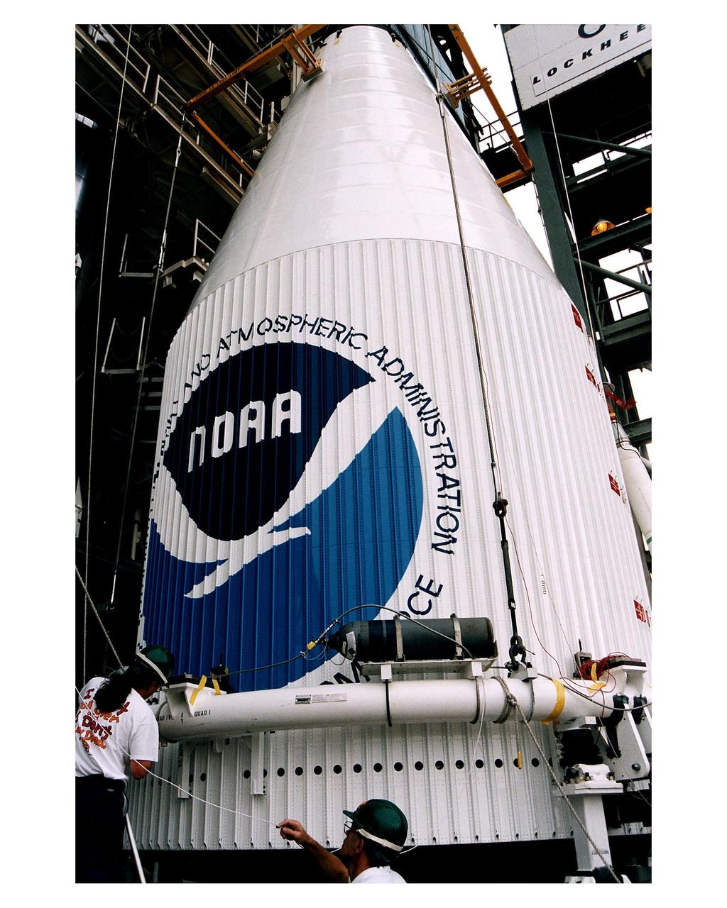 Workers prepare for the mating of the Atlas 1 payload fairing containing the GOES-K advanced weather satellite with the Lockheed Martin Atlas 1 expendable launch vehicle (AC-79) at Launch Complex 36, Pad B, Cape Canaveral Air Station. GOES-K will be the third spacecraft to be launched in the advanced series of Geostationary Operational Environmental Satellites (GOES). The GOES satellites are owned and operated by the National Oceanic and Atmospheric Administration (NOAA); NASA manages the design, development and launch of the spacecraft. GOES-K is targeted for an <a href="http://www-pao.ksc.nasa.gov/kscpao/release/1997/63-97.htm">April 24 launch</a> during a launch window which extends from 1:50-3:09 a.m. EDT