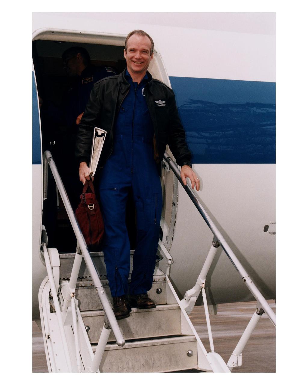 STS-84 Commander Charles J. Precourt arrives at KSC’s Shuttle Landing Facility for the Terminal Countdown Demonstration Test (TCDT), a dress rehearsal for launch. Precourt will lead the six other crew members when they travel to Mir next month aboard the Space Shuttle Atlantis. STS-84 Mission Specialist C. Michael Foale will be dropped off on Mir to become a member of the Mir 23 crew, replacing U.S. astronaut Jerry M. Linenger, who will return to Earth on Atlantis after about four months on the orbiting station. STS-84 will be the sixth Shuttle-Mir docking. Liftoff is targeted for May 15