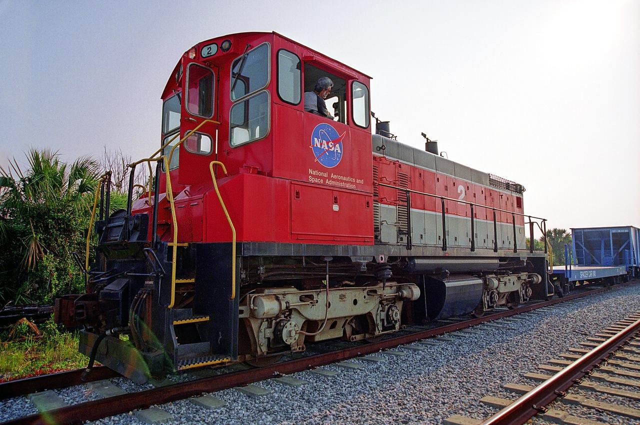 CAPE CANAVERAL, Fla. – A NASA railroad train moves along the track at NASA's Kennedy Space Center in Florida. The space agency utilizes railroad operations to not only move equipment at Kennedy, but to transport hardware to and from contractor facilities across the nation. Photo credit: NASA