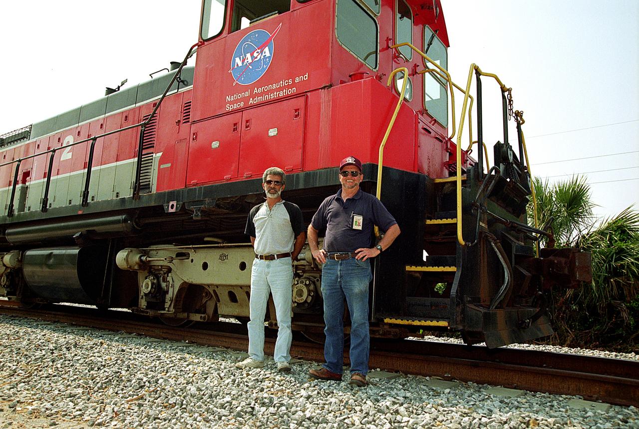 CAPE CANAVERAL, Fla. – These two locomotive engineers are among those who operate NASA railroad trains at NASA's Kennedy Space Center in Florida. The space agency utilizes railroad operations to not only move equipment at Kennedy, but to transport hardware to and from contractor facilities across the nation. Photo credit: NASA