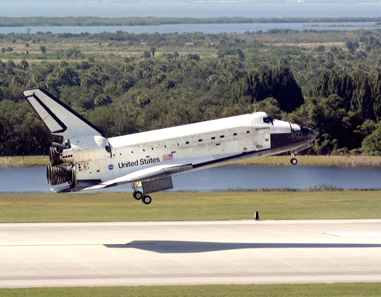 Orbiter Discovery gets ready to land on runway 33 at the Shuttle Landing Facility after a successful 3.6-million-mile voyage on mission STS-95