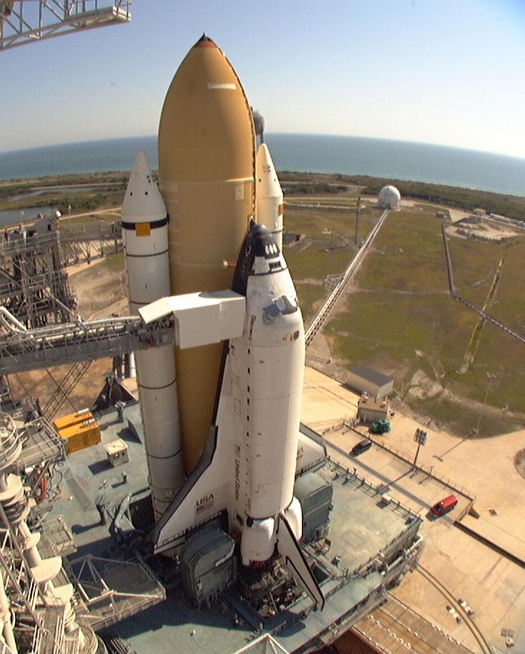Space Shuttle Discovery sits atop a mobile launcher platform at Launch Complex 39A after its move this morning from Vehicle Assembly Building high bay 1 where it was mated to the first Space Shuttle super lightweight external tank/solid rocket booster stack. Discovery will be launched on mission STS-91, concluding Phase I of the joint U.S.-Russian International Space Station Program, on June 2 with a launch window opening around 6:10 p.m. EDT. This will be the ninth Shuttle docking with the Russian Space Station Mir, but the first Mir docking for Discovery. The STS-91 flight crew includes Commander Charles Precourt; Pilot Dominic Gorie; and Mission Specialists Wendy B. Lawrence; Franklin Chang-Diaz, Ph.D.; Janet Kavandi, Ph.D.; and Valery Ryumin, with the Russian Space Agency. Andrew Thomas, Ph.D., will be returning to Earth with the crew after living more than four months aboard Mir