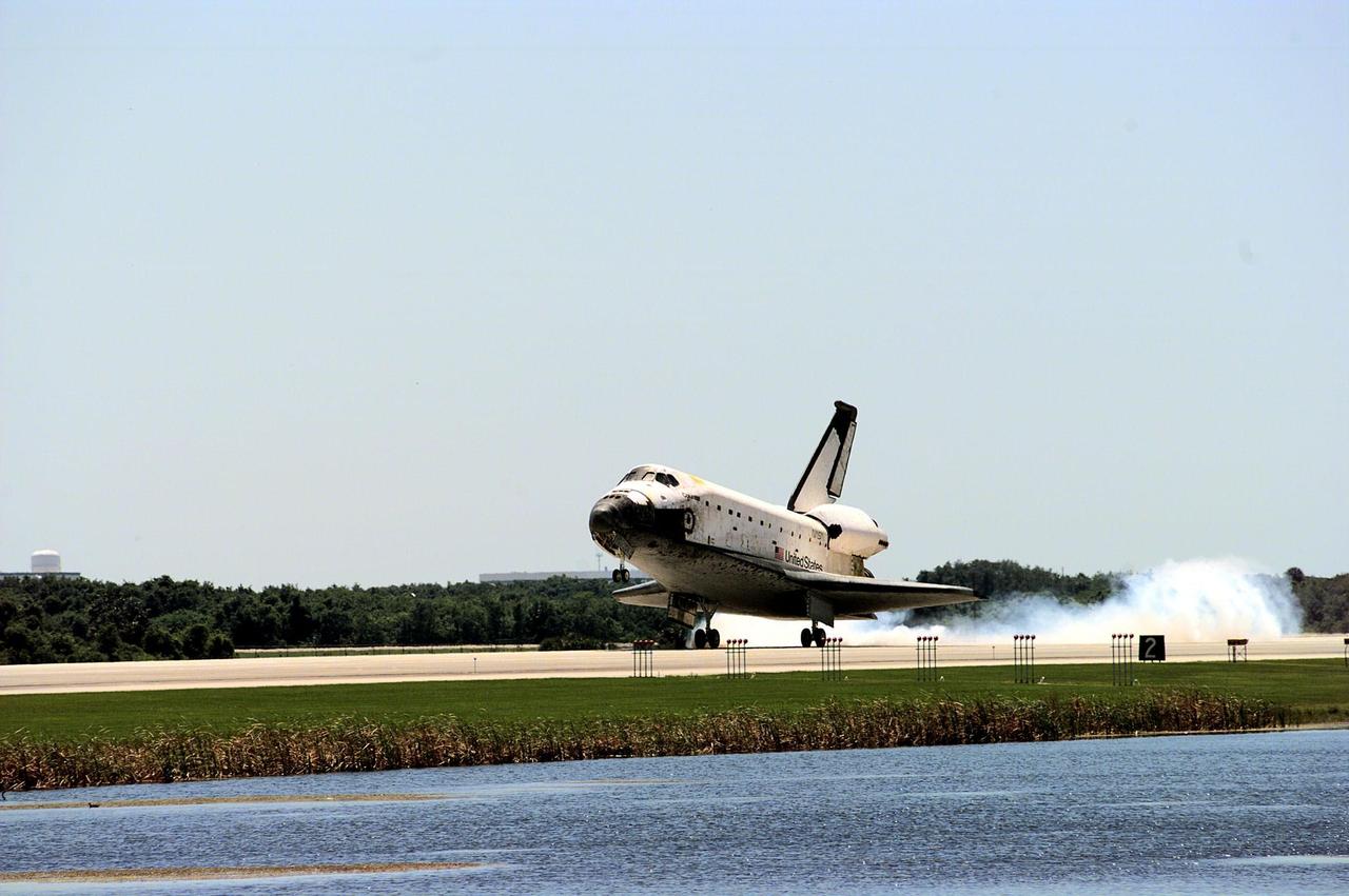 KENNEDY SPACE CENTER, FLA. -- The orbiter Columbia touches down on Runway 33 of KSC's Shuttle Landing Facility to complete the nearly 16-day STS-90 mission. Main gear touchdown was at 12:08:59 p.m. EDT on May 3, 1998, landing on orbit 256 of the mission. The wheels stopped at 12:09:58 EDT, completing a total mission time of 15 days, 21 hours, 50 minutes and 58 seconds. The 90th Shuttle mission was Columbia's 13th landing at the space center and the 43rd KSC landing in the history of the Space Shuttle program. During the mission, the crew conducted research to contribute to a better understanding of the human nervous system. The crew of the STS-90 Neurolab mission include Commander Richard Searfoss; Pilot Scott Altman; Mission Specialists Richard Linnehan, D.V.M., Dafydd (Dave) Williams, M.D., with the Canadian Space Agency, and Kathryn (Kay) Hire; and Payload Specialists Jay Buckey, M.D., and James Pawelczyk, Ph.D