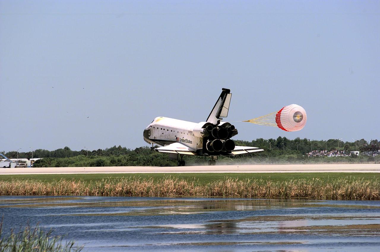KENNEDY SPACE CENTER, FLA. -- The orbiter Columbia touches down on Runway 33 of KSC's Shuttle Landing Facility to complete the nearly 16-day STS-90 mission. Main gear touchdown was at 12:08:59 p.m. EDT on May 3, 1998, landing on orbit 256 of the mission. The wheels stopped at 12:09:58 EDT, completing a total mission time of 15 days, 21 hours, 50 minutes and 58 seconds. The 90th Shuttle mission was Columbia's 13th landing at the space center and the 43rd KSC landing in the history of the Space Shuttle program. During the mission, the crew conducted research to contribute to a better understanding of the human nervous system. The crew of the STS-90 Neurolab mission include Commander Richard Searfoss; Pilot Scott Altman; Mission Specialists Richard Linnehan, D.V.M., Dafydd (Dave) Williams, M.D., with the Canadian Space Agency, and Kathryn (Kay) Hire; and Payload Specialists Jay Buckey, M.D., and James Pawelczyk, Ph.D