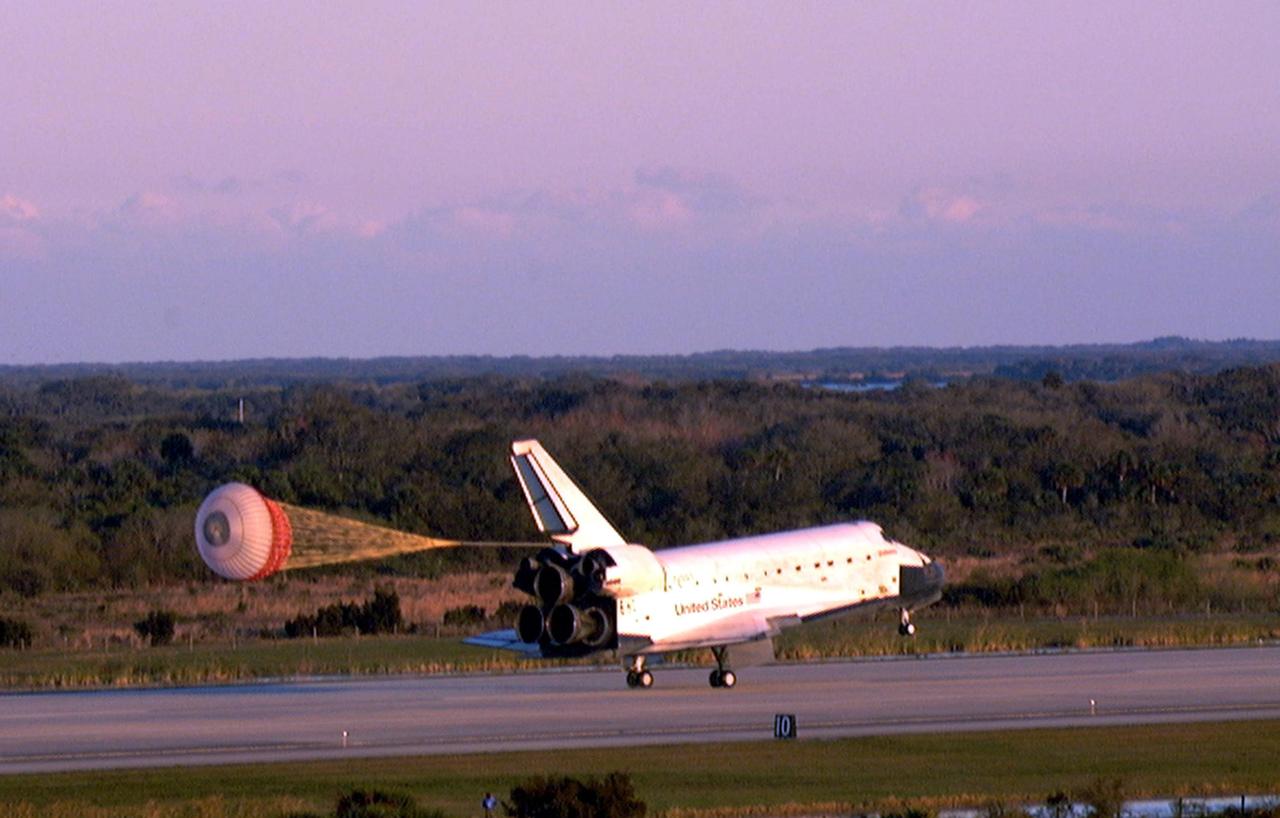 KENNEDY SPACE CENTER, FLA. -- The Space Shuttle orbiter Endeavour touches down on Runway 15 of the KSC Shuttle Landing Facility (SLF) to complete the nearly nine-day STS-89 mission. Main gear touchdown was at 5:35:09 p.m. EST on Jan. 31, 1998. The wheels stopped at 5:36:19 EST, completing a total mission time of eight days, 19 hours, 48 minutes and four seconds. The 89th Space Shuttle mission was the 42nd (and 13th consecutive) landing of the orbiter at KSC, and STS-89 was the eighth of nine planned dockings of the Space Shuttle with the Russian Space Station Mir. STS-89 Mission Specialist Andrew Thomas, Ph.D., succeeded NASA astronaut and Mir 24 crew member David Wolf, M.D., who was on the Russian space station since late September 1997. Dr. Wolf returned to Earth on Endeavour with the remainder of the STS-89 crew, including Commander Terrence Wilcutt; Pilot Joe Edwards Jr.; and Mission Specialists James Reilly, Ph.D.; Michael Anderson; Bonnie Dunbar, Ph.D.; and Salizhan Sharipov with the Russian Space Agency. Dr. Thomas is scheduled to remain on Mir until the STS-91 Shuttle mission returns in June 1998. In addition to the docking and crew exchange, STS-89 included the transfer of science, logistical equipment and supplies between the two orbiting spacecrafts