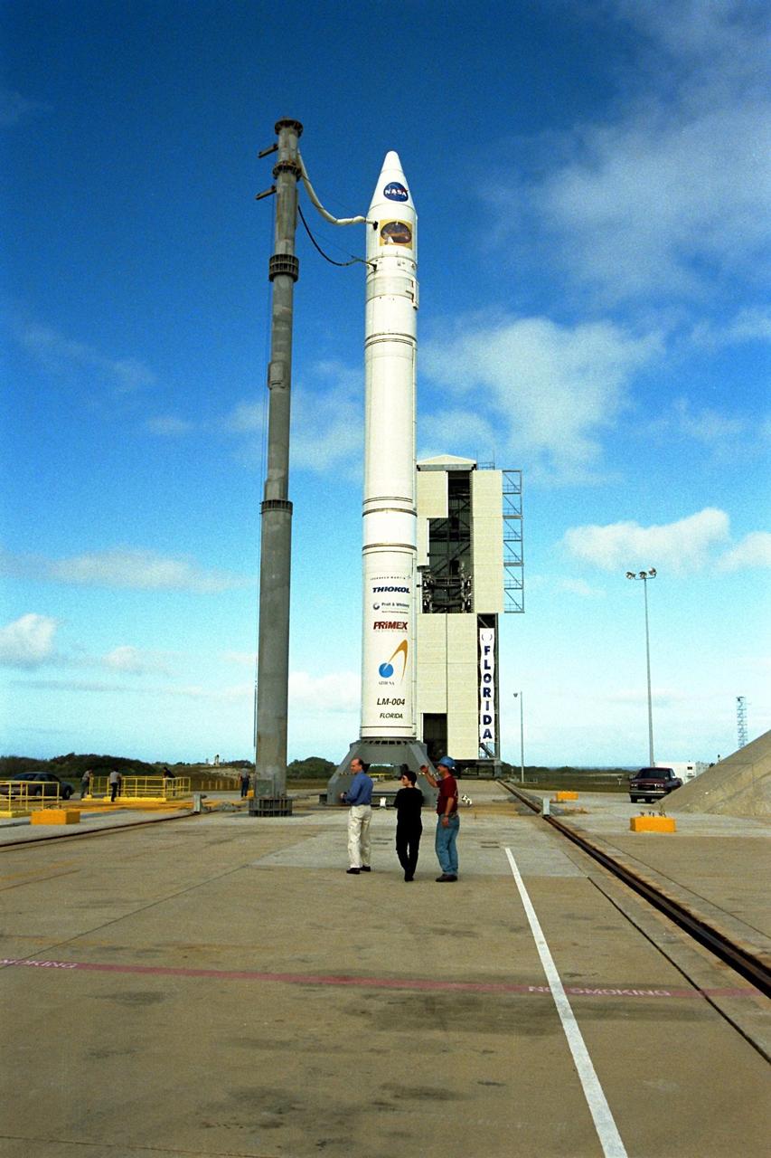 NASA’s Lunar Prospector is readied for launch as its gantry-like service tower is rolled back at Cape Canaveral Air Station’s Launch Complex 46. Lunar Prospector, built for the NASA Ames Research Center by Lockheed Martin, is a spin-stabilized spacecraft designed to provide NASA with the first global maps of the Moon’s surface and its gravitational magnetic fields, as well as look for the possible presence of ice near the lunar poles. It will orbit the Moon at an altitude of approximately 63 miles during a one-year mission. The launch of Lunar Prospector is scheduled for Jan. 5, 1998 at 8:31 p.m. EST