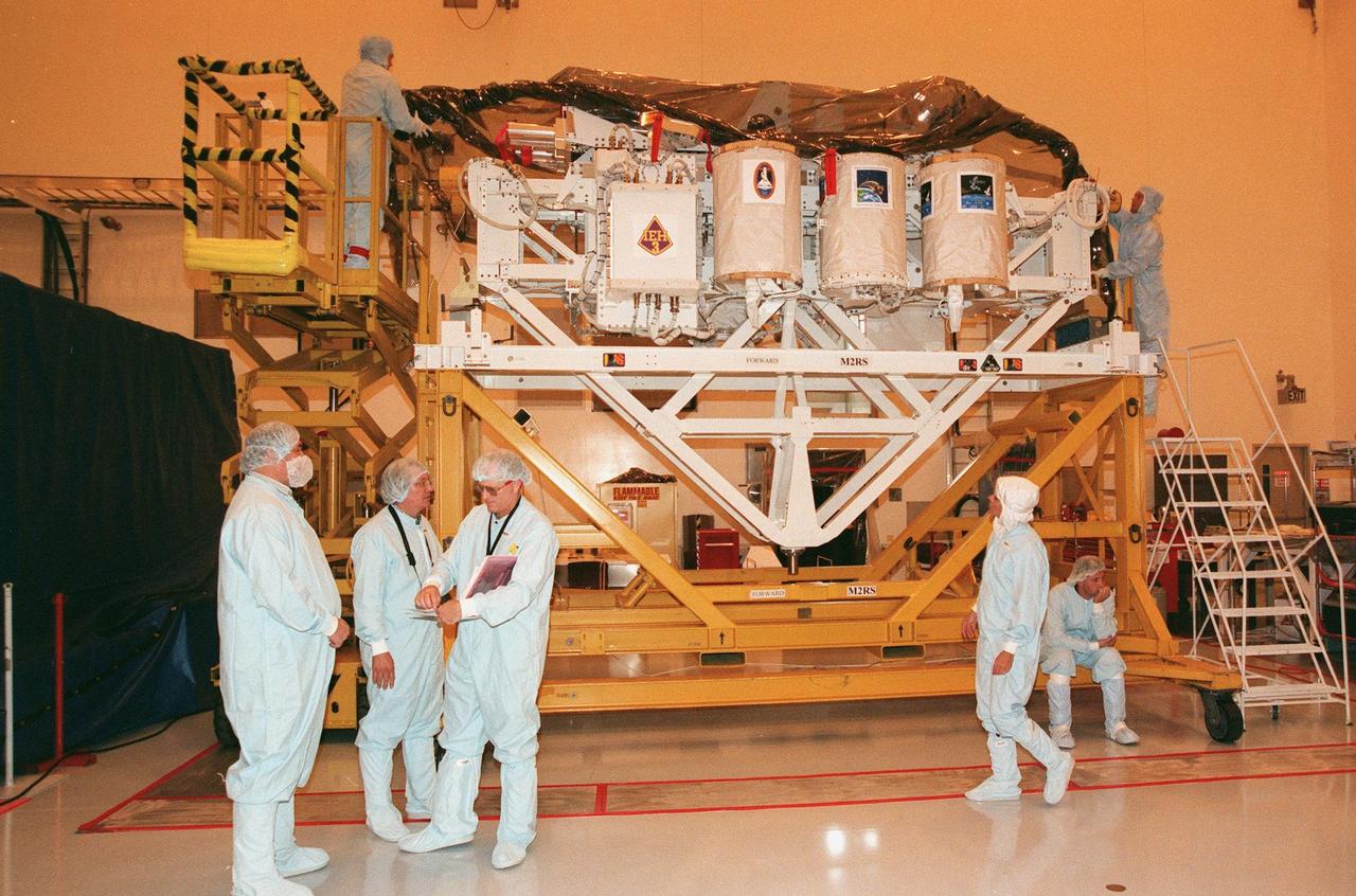 KENNEDY SPACE CENTER, FLA. The International Extreme Ultraviolet Hitchhiker-3 (IEH-3), one of the payloads for the STS-95 mission, is prepared for launch in the Multi-Payload Processing Facility. IEH-3 is comprised of seven experiments, including one that will be deployed on Flight Day 3. It is the small, non-recoverable Petite Amateur Navy Satellite (PANSAT) which will store and transmit digital communications. Other IEH investigations are the Solar Constant Experiment (SOLCON), Solar Extreme Ultraviolet Hitchhiker (SEH), Spectrograph/Telescope for Astronomical Research (STAR-LITE), Ultraviolet Spectrograph Telescope for Astronomical Research (UVSTAR), Consortium for Materials Development in Space Complex Autonomous Payloads (CONCAP-IV) for growing thin films via physical vapor transport, and two Get-Away Special (GAS) canister experiments. The experiments will be mounted on a hitchhiker bridge in Discovery's payload bay