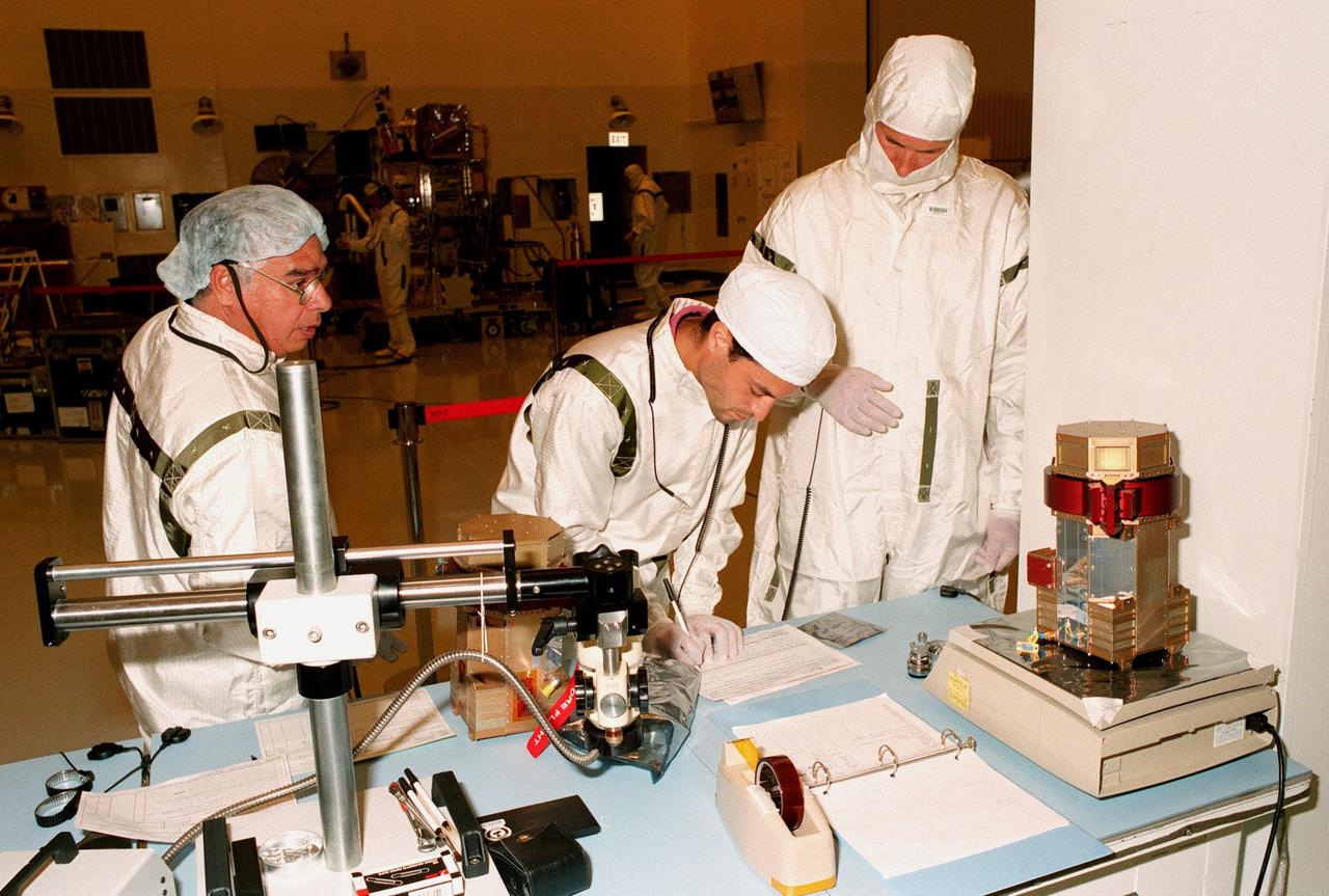 The Plasma Experiment for Planetary Exploration (PEPE), one of two advanced science experiments flying on the Deep Space l mission, is prepared for installation on the spacecraft in the Payload Hazardous Servicing Facility. PEPE combines several instruments that study space plasma in one compact 13-pound (6-kilogram) package. Space plasma is composed of charged particles, most of which flow outward from the Sun. The first flight in NASA's New Millennium Program, Deep Space 1 is designed to validate 12 new technologies for scientific space missions of the next century. The spacecraft is scheduled to launch during a period opening Oct. 15 and closing Nov. 10, 1998. Most of its mission objectives will be completed within the first two months. A near-earth asteroid, 1992 KD, has also been selected for a possible flyby