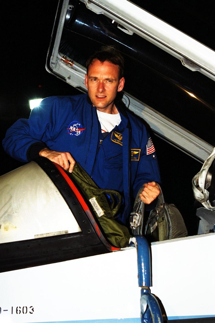 STS-89 Pilot Joe Edwards Jr., poses in his T-38 jet trainer after landing with other members of the flight crew at KSC’s Shuttle Landing Facility from NASA’s Johnson Space Center to begin Terminal Countdown Demonstration Test (TCDT) activities. The TCDT is held at KSC prior to each Space Shuttle flight to provide crews with the opportunity to participate in simulated countdown activities. Endeavour is targeted for launch of STS-89 on Jan. 22 at 9:48 p.m. EST, which will be the first mission of 1998 and the eighth to dock with Russia’s Mir Space Station. The mission is scheduled to last nine days